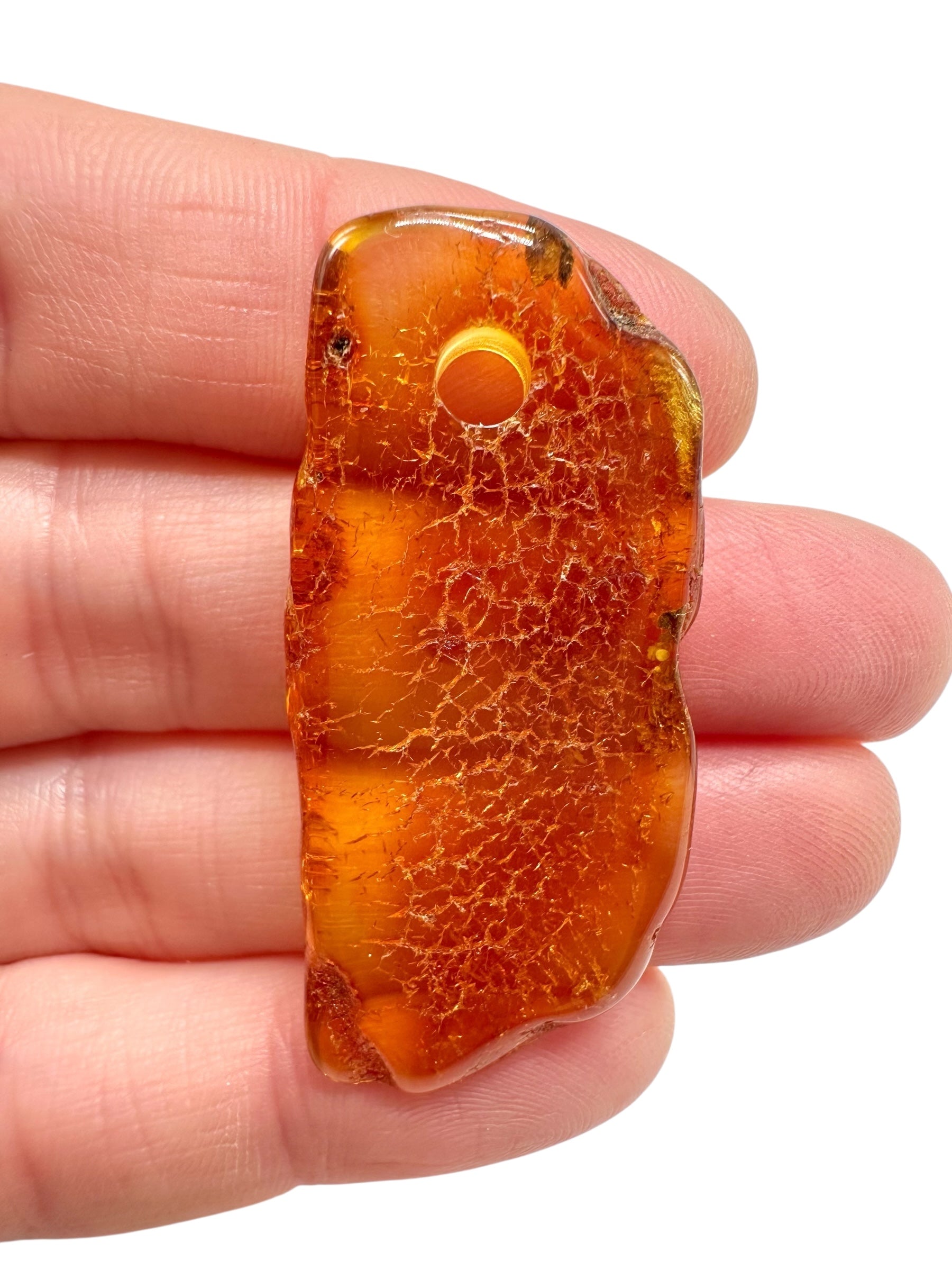 Amber with a drilled hole for hanging 2,8g – Lithuania - JND120