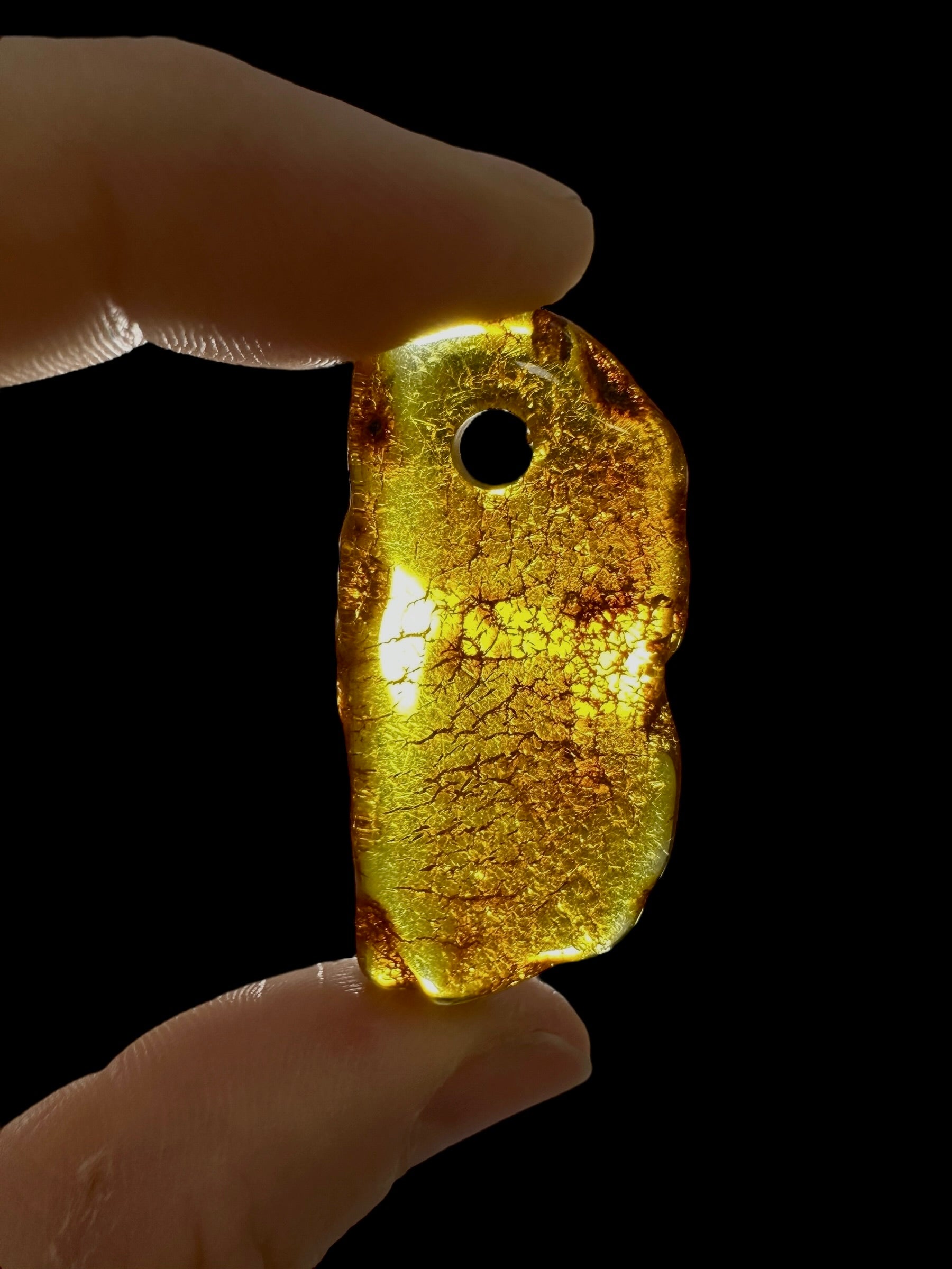 Amber with a drilled hole for hanging 2,8g – Lithuania - JND120