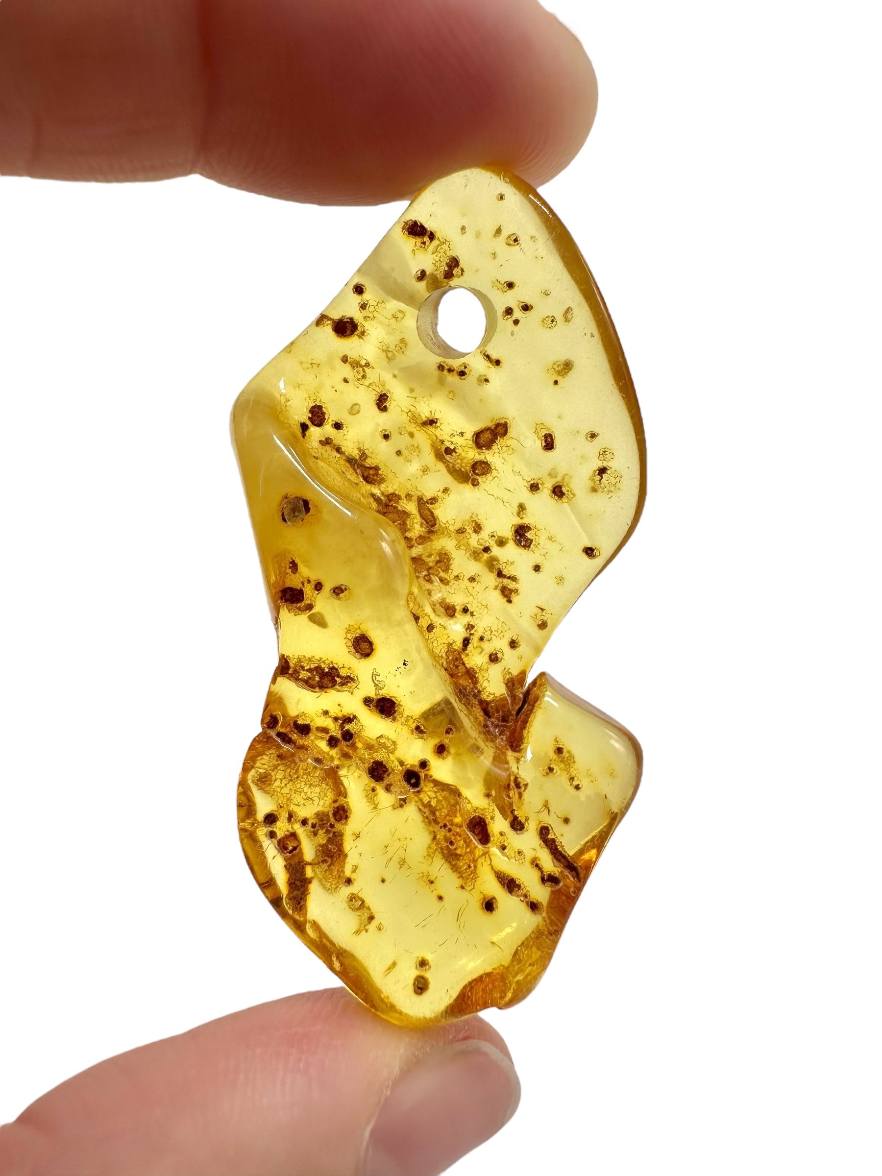 Amber with a drilled hole for hanging 6,3g – Lithuania - JND121