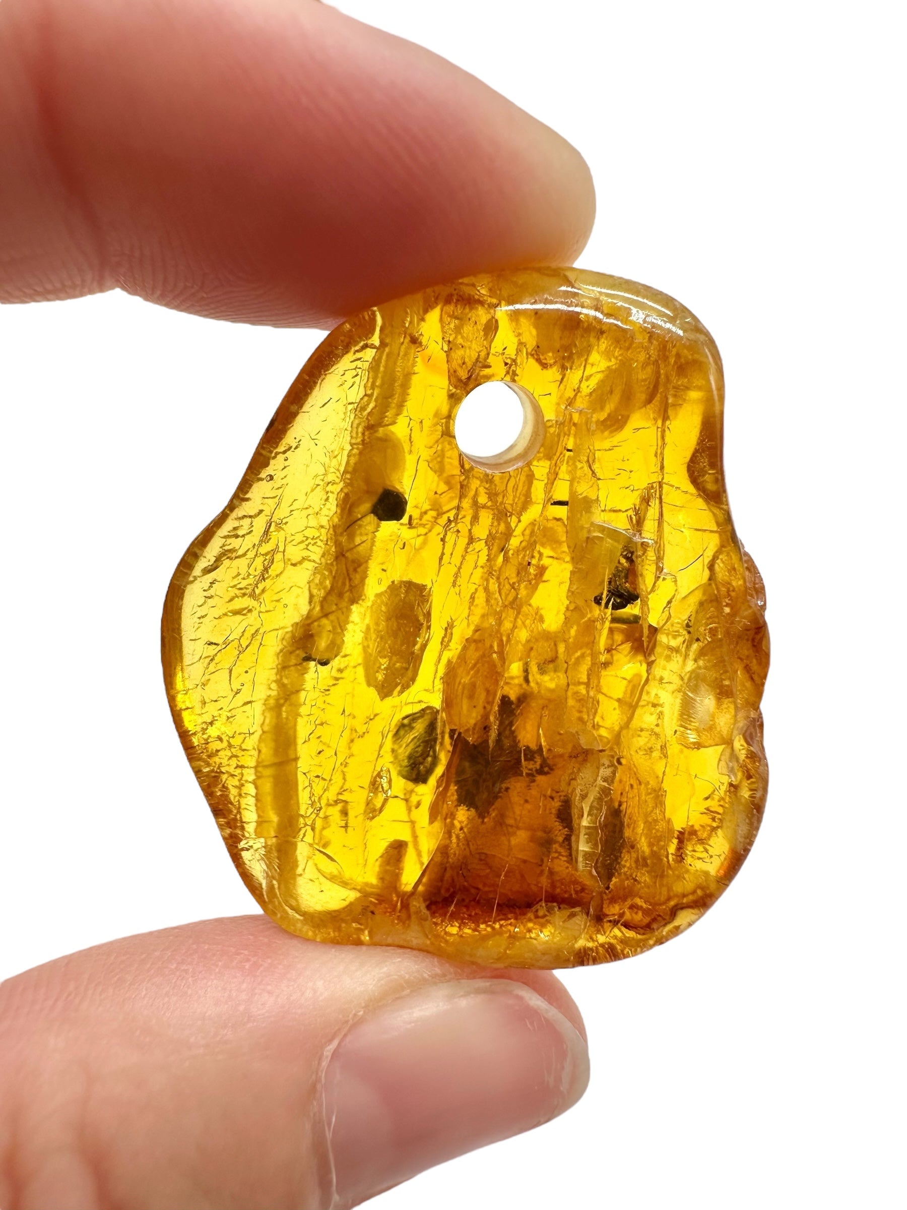 Amber with a drilled hole for hanging 5g – Lithuania - JND122