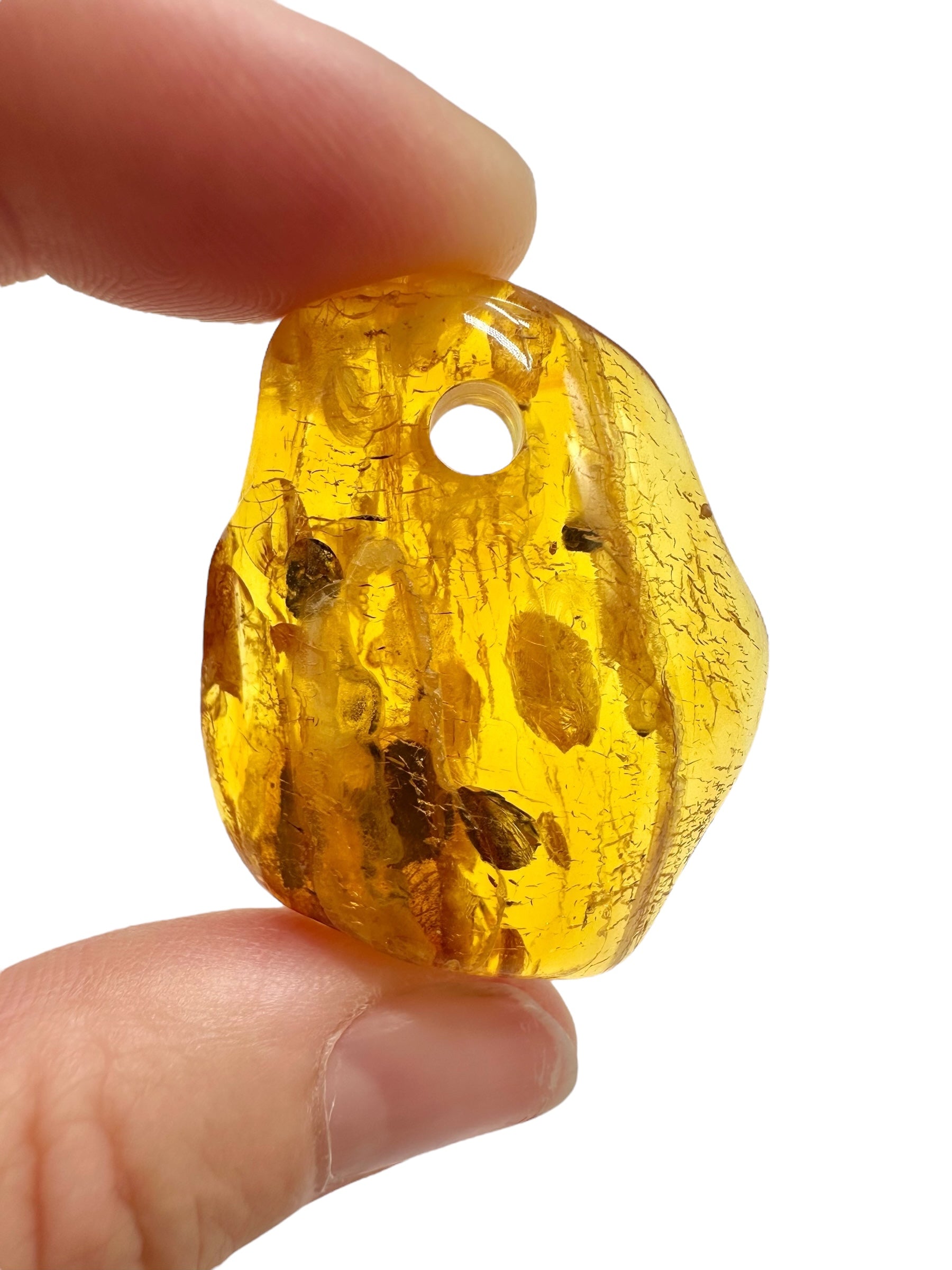 Amber with a drilled hole for hanging 5g – Lithuania - JND122