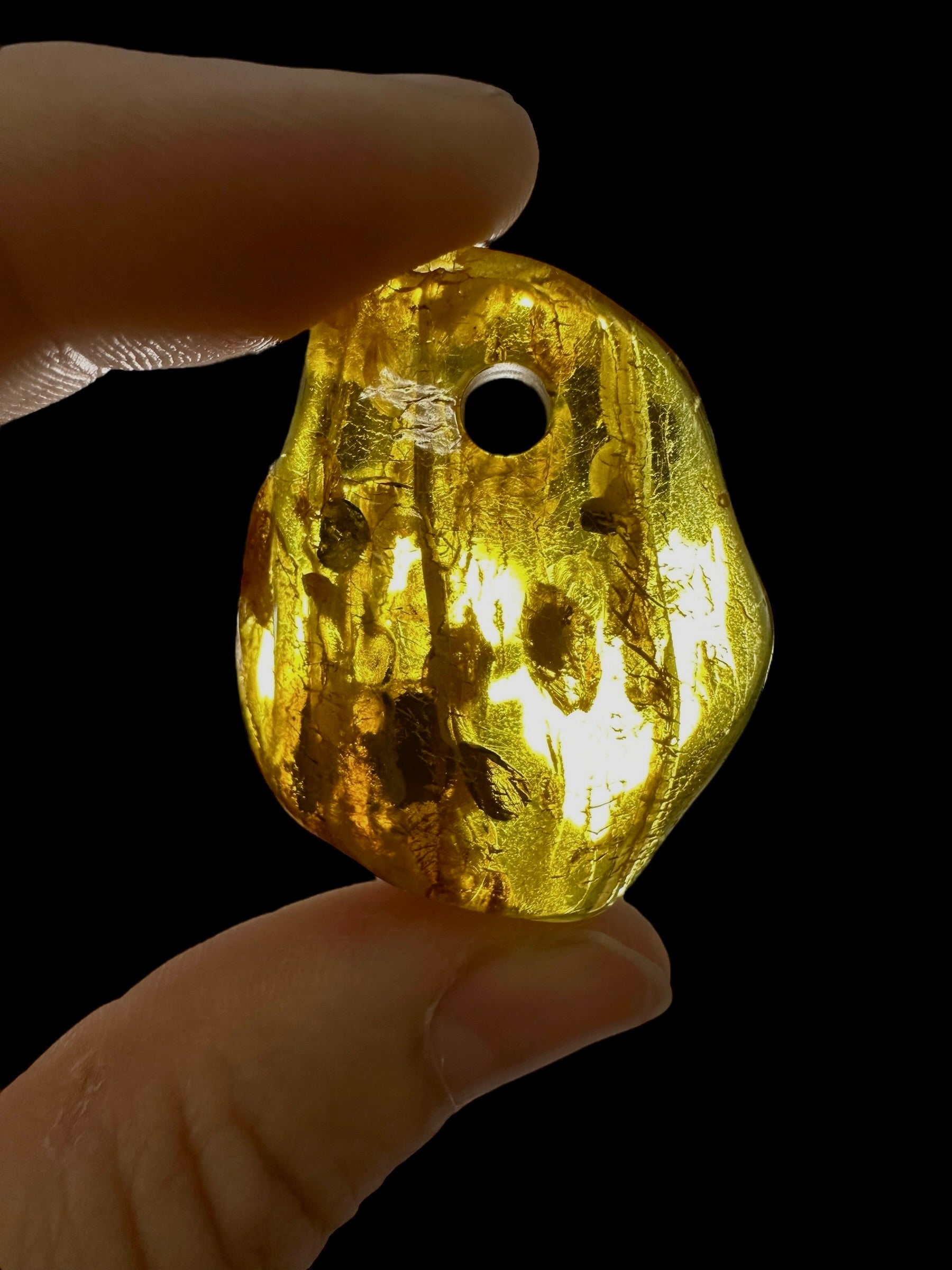 Amber with a drilled hole for hanging 5g – Lithuania - JND122