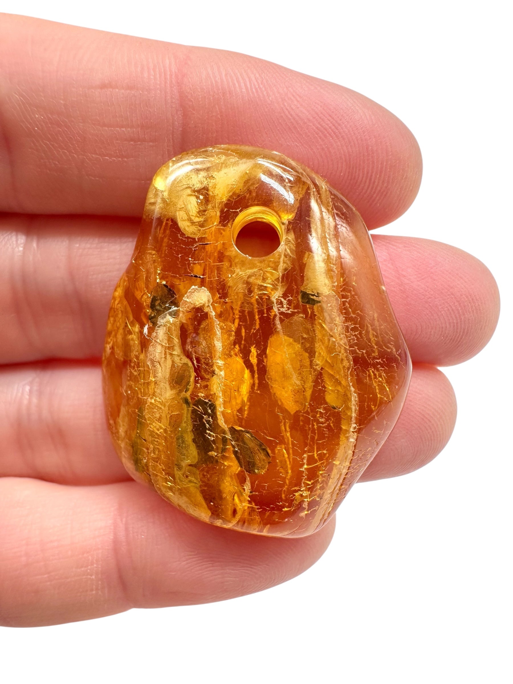 Amber with a drilled hole for hanging 5g – Lithuania