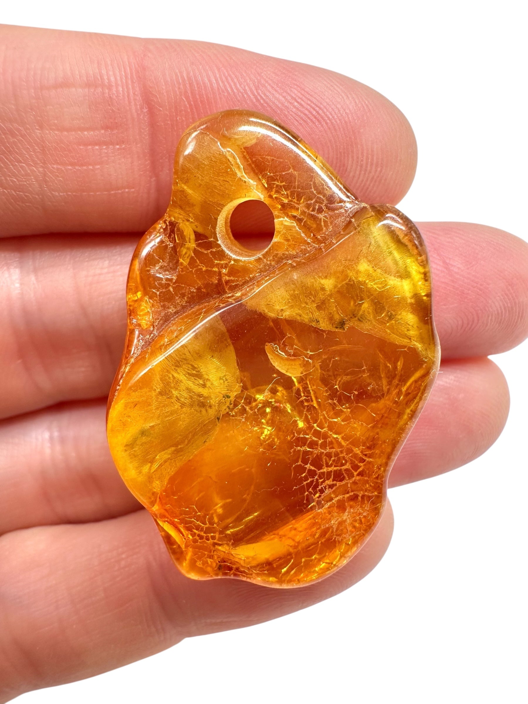 Amber with a drilled hole for hanging 4,7g – Lithuania - JND123
