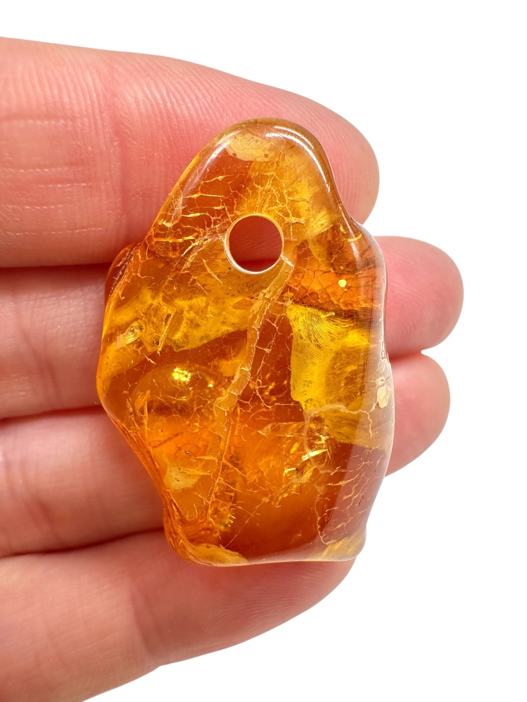 Amber with a drilled hole for hanging 4,7g – Lithuania