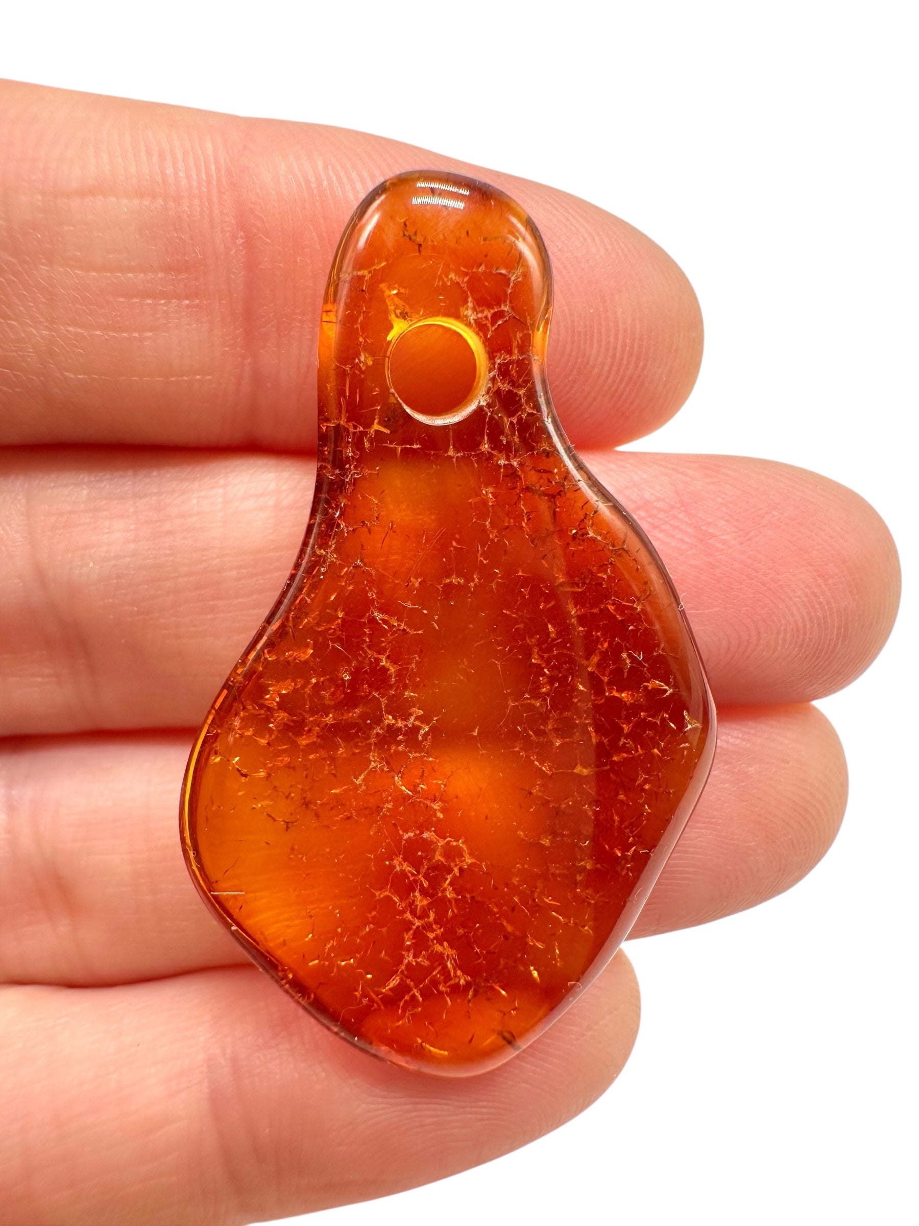 Amber with a drilled hole for hanging 2,6g – Lithuania - JND124