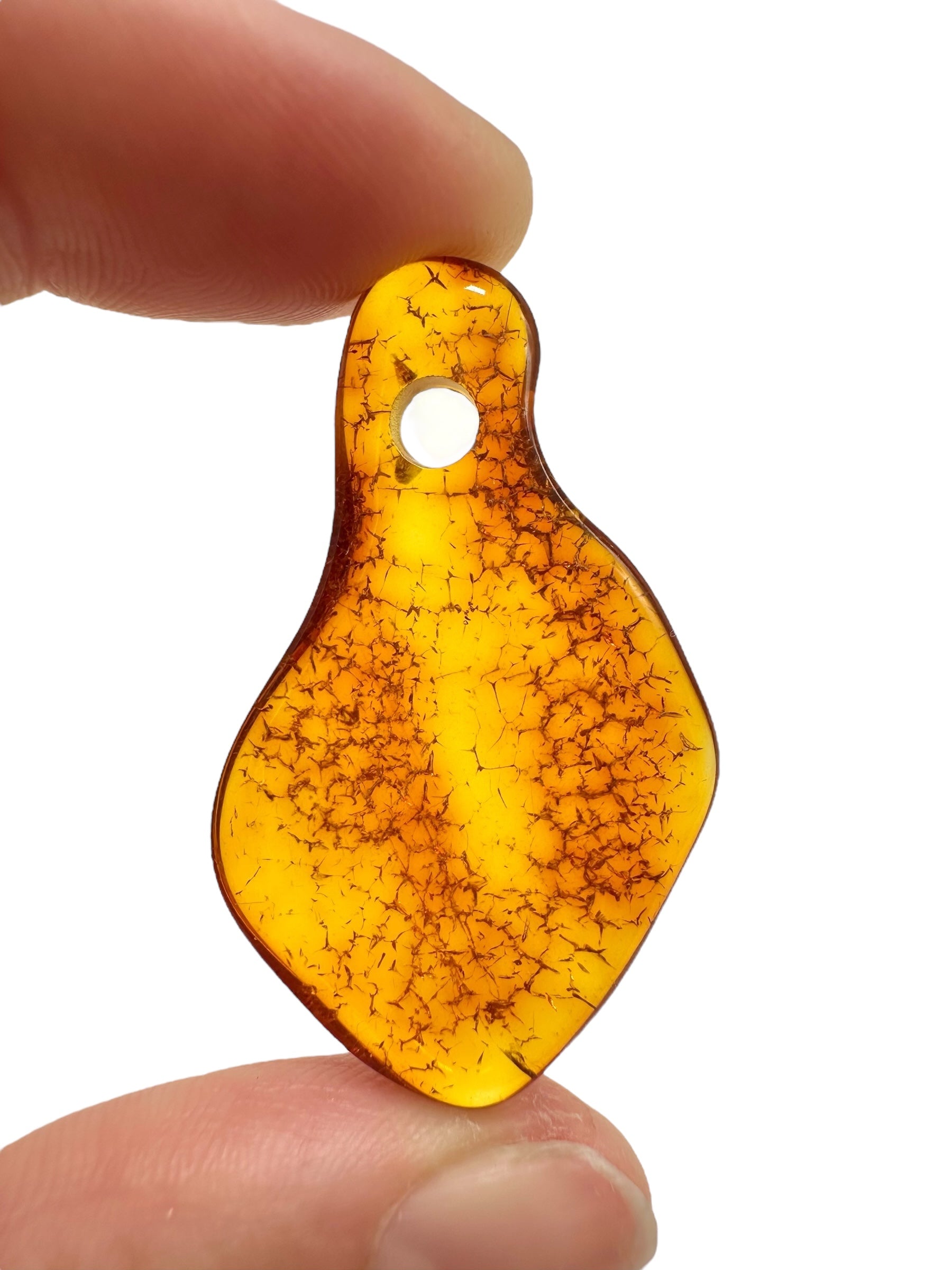 Amber with a drilled hole for hanging 2,6g – Lithuania - JND124