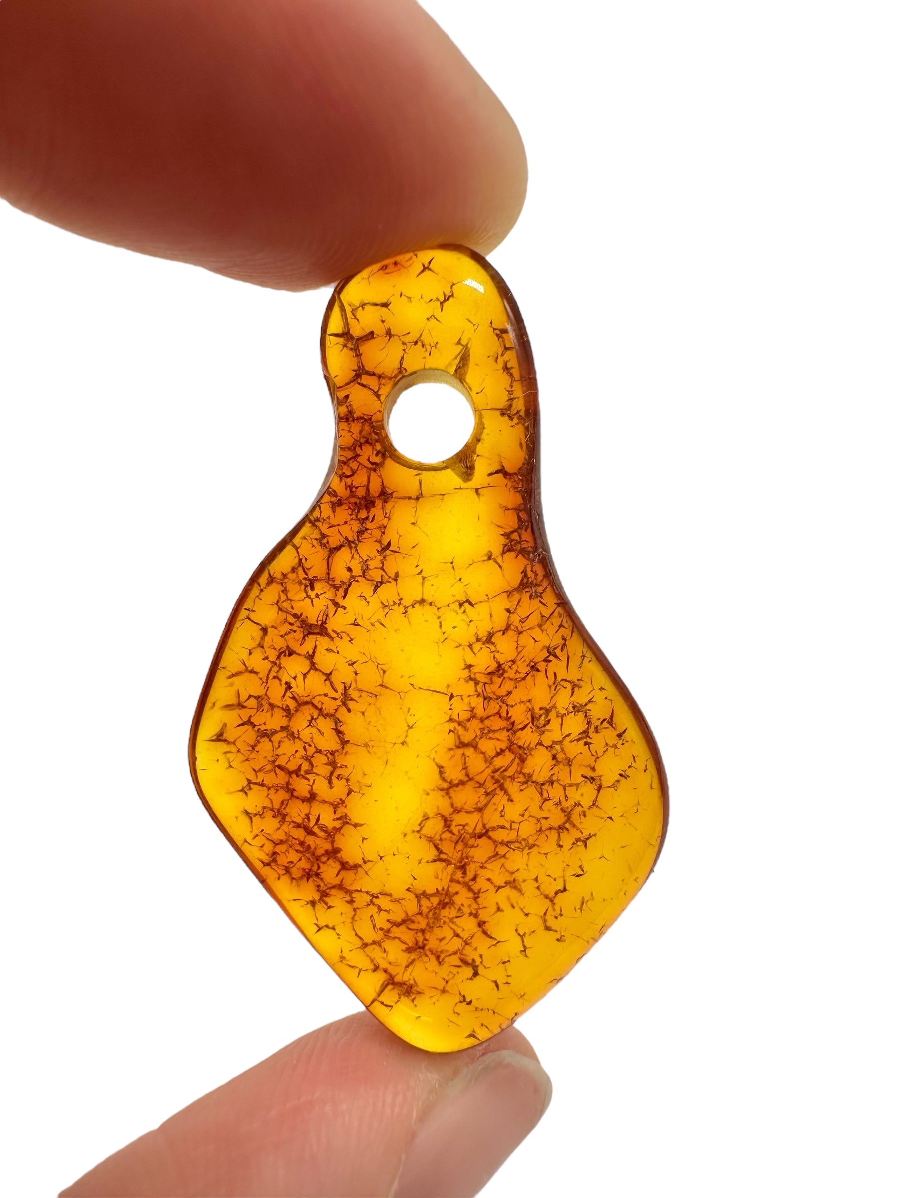 Amber with a drilled hole for hanging 2,6g – Lithuania - JND124