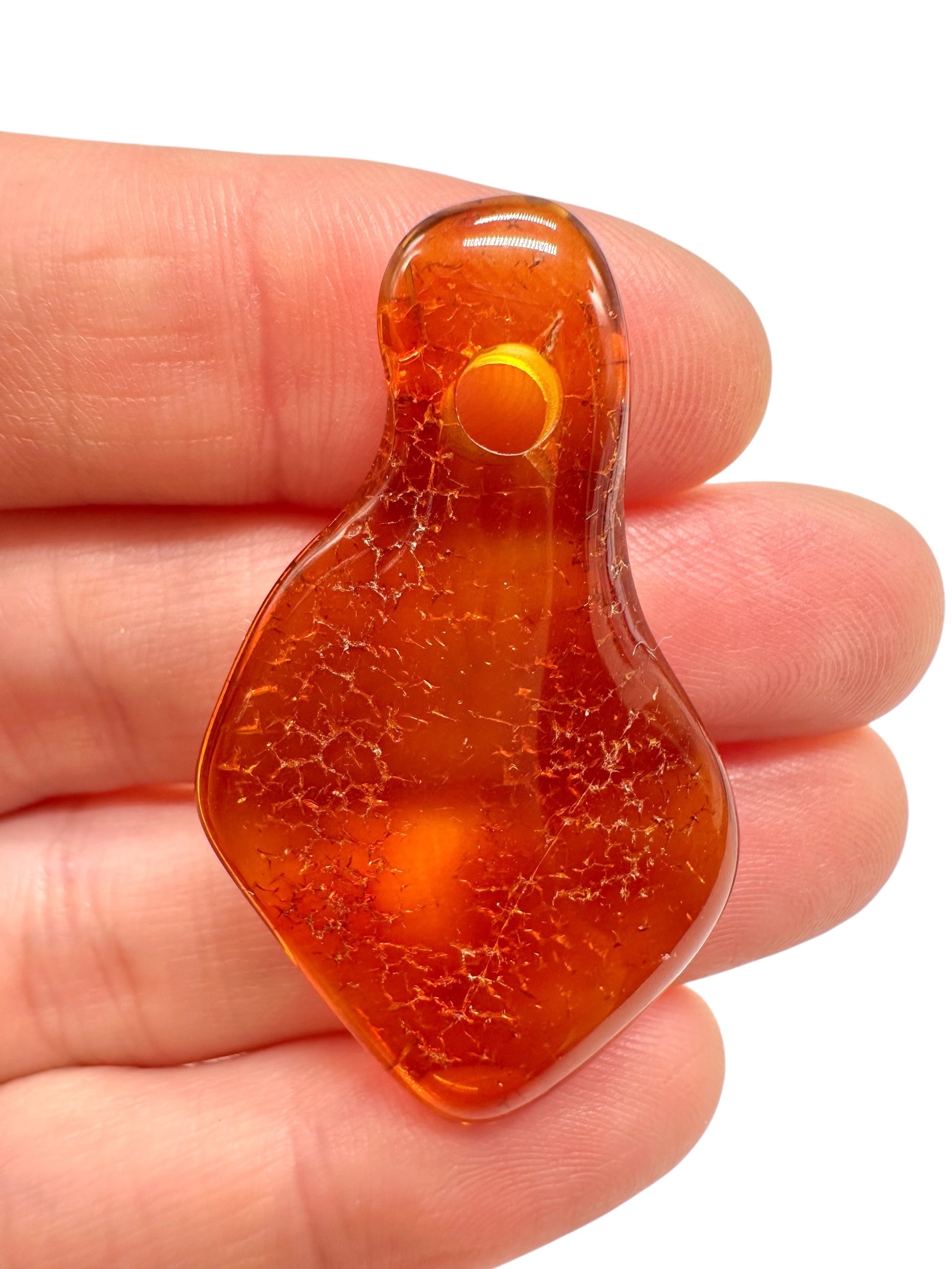 Amber with a drilled hole for hanging 2,6g – Lithuania