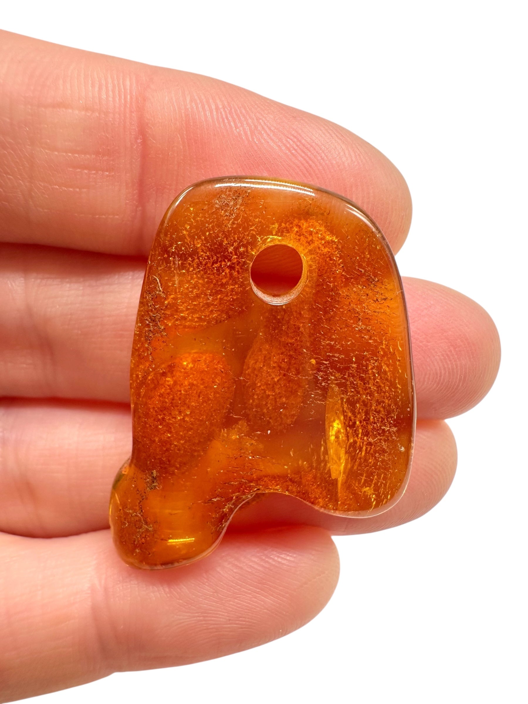 Amber with a drilled hole for hanging 2,6g – Lithuania - JND125