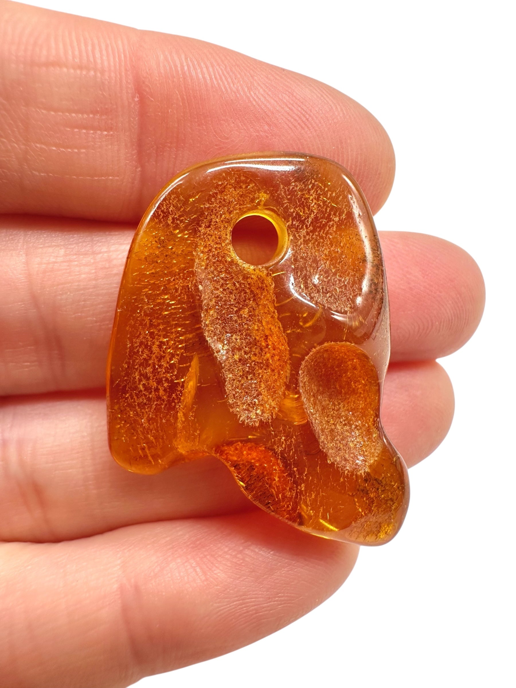 Amber with a drilled hole for hanging 2,6g – Lithuania