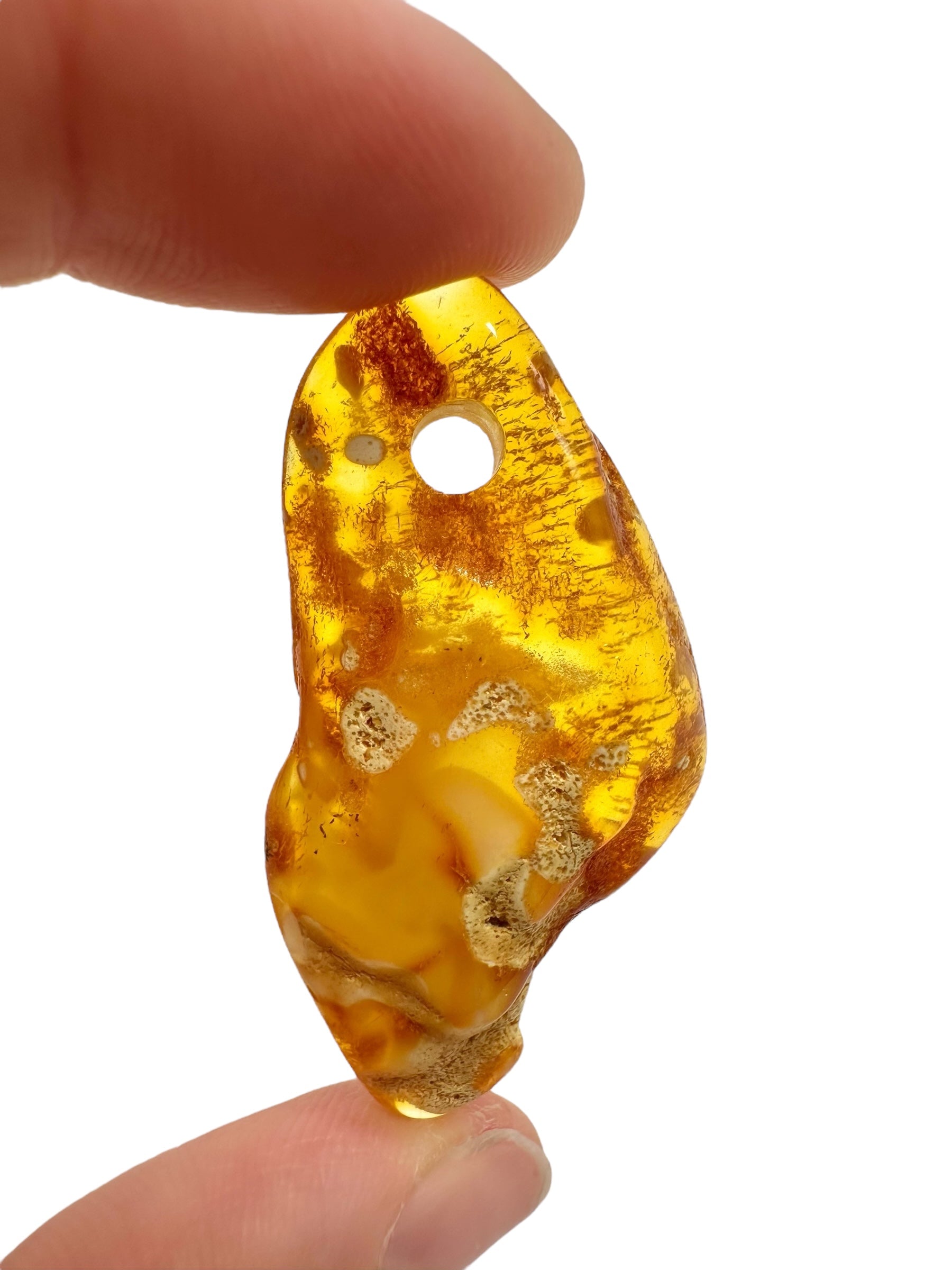 Amber with a drilled hole for hanging 3,6g – Lithuania - JND127