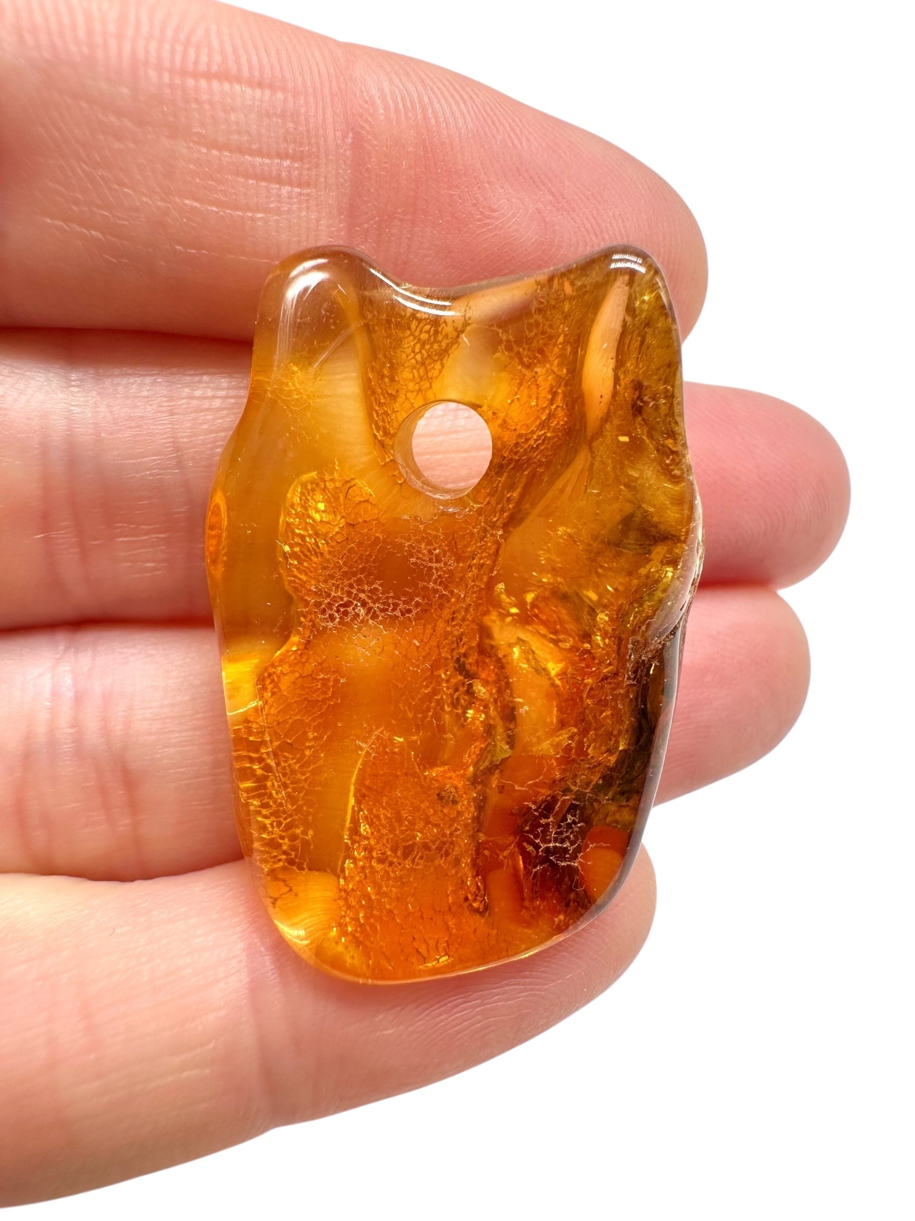 Amber with a drilled hole for hanging 3,5g – Lithuania