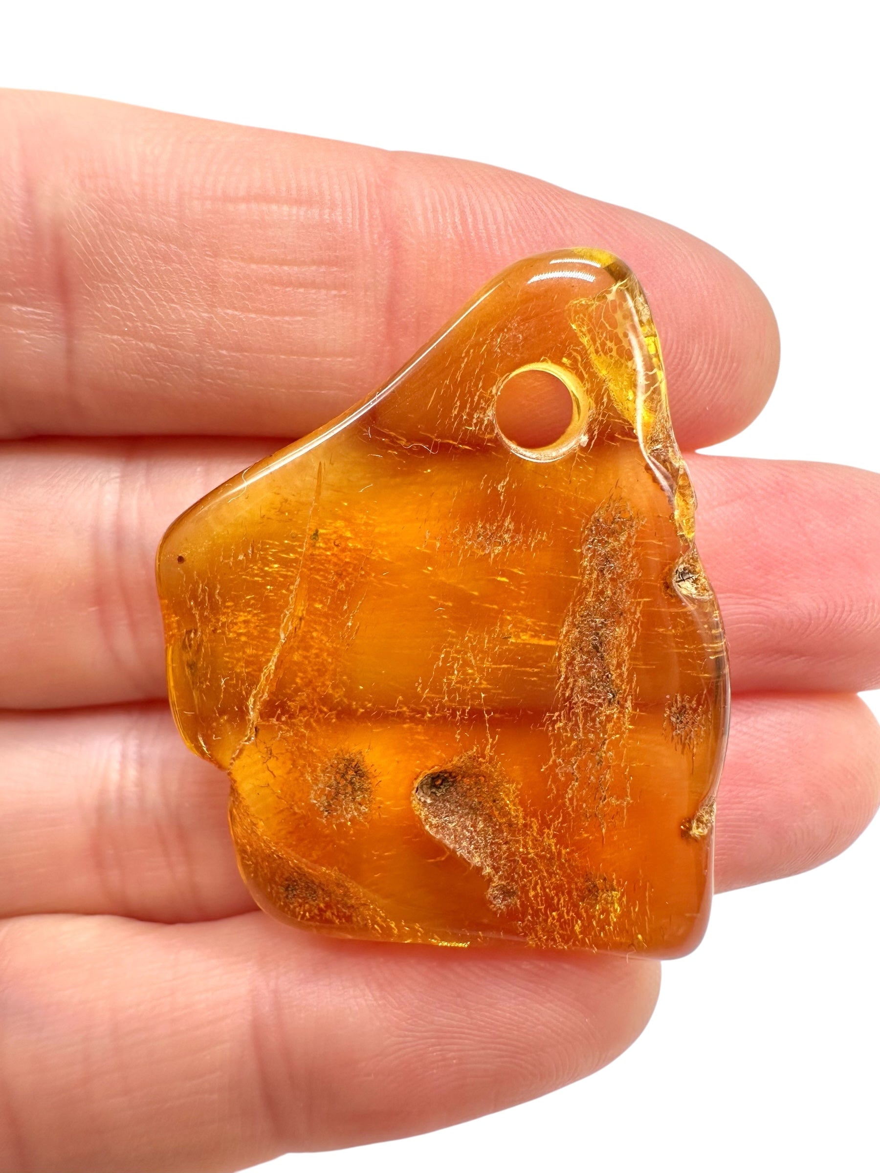 Amber with a drilled hole for hanging 4,2g – Lithuania - JND129