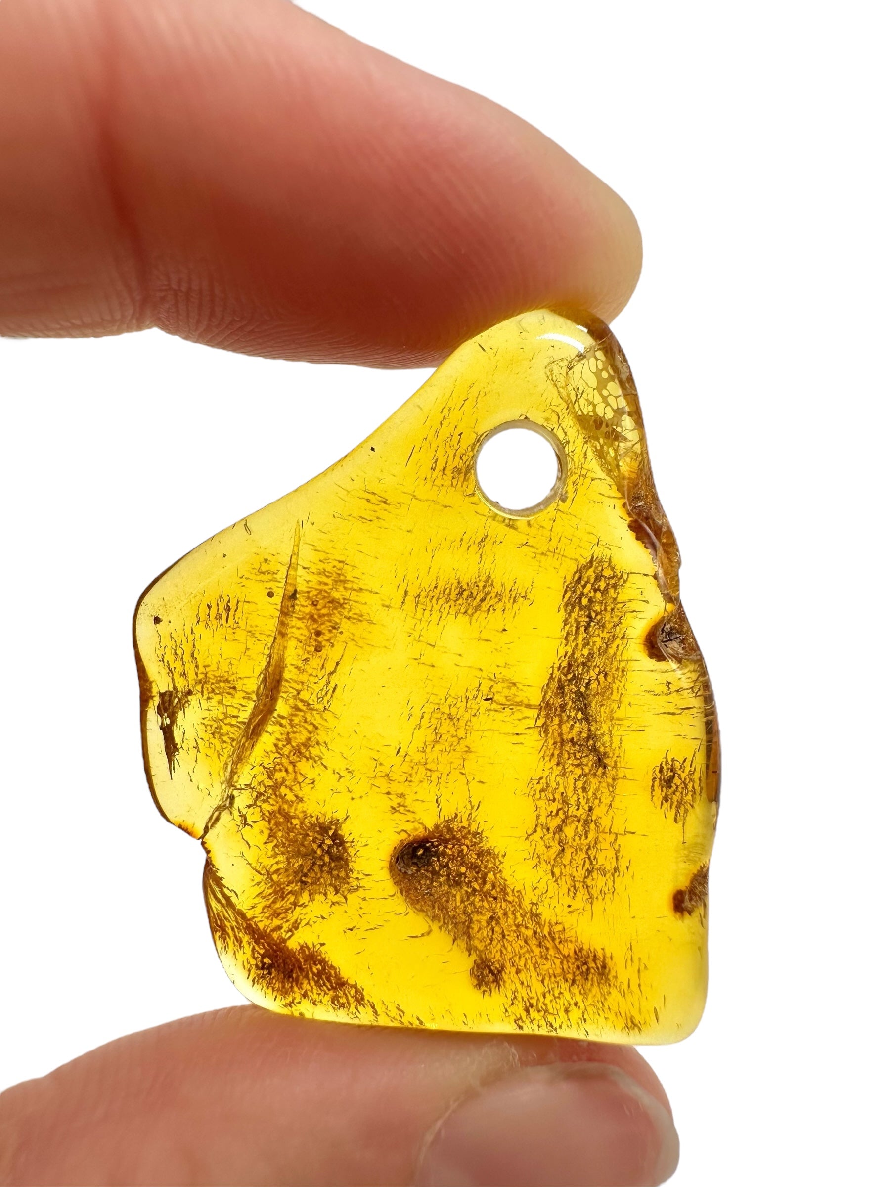 Amber with a drilled hole for hanging 4,2g – Lithuania - JND129