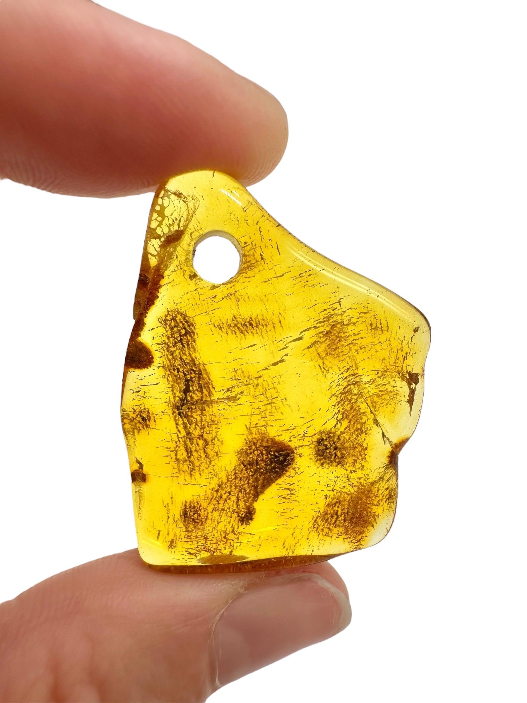 Amber with a drilled hole for hanging 4,2g – Lithuania - JND129