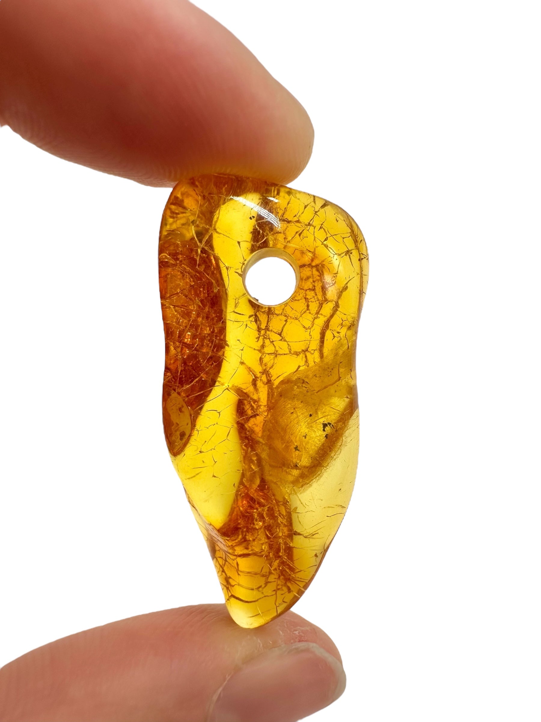 Amber with a drilled hole for hanging 2,7g – Lithuania - JND130
