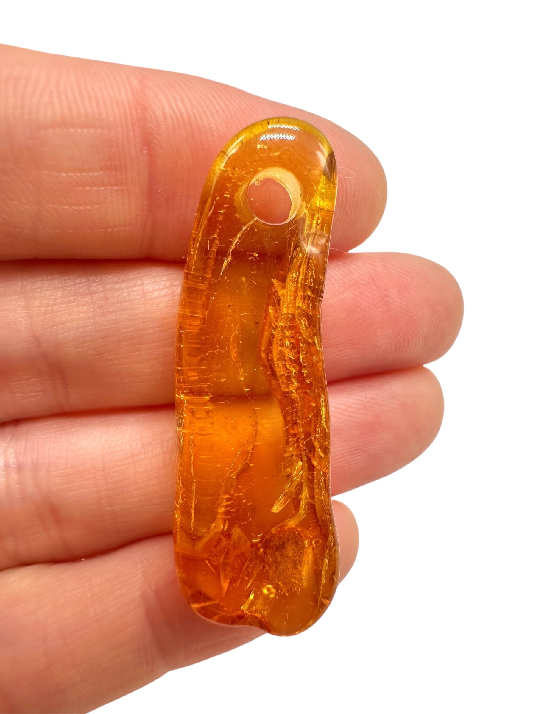 Amber with a drilled hole for hanging 2,9g – Lithuania