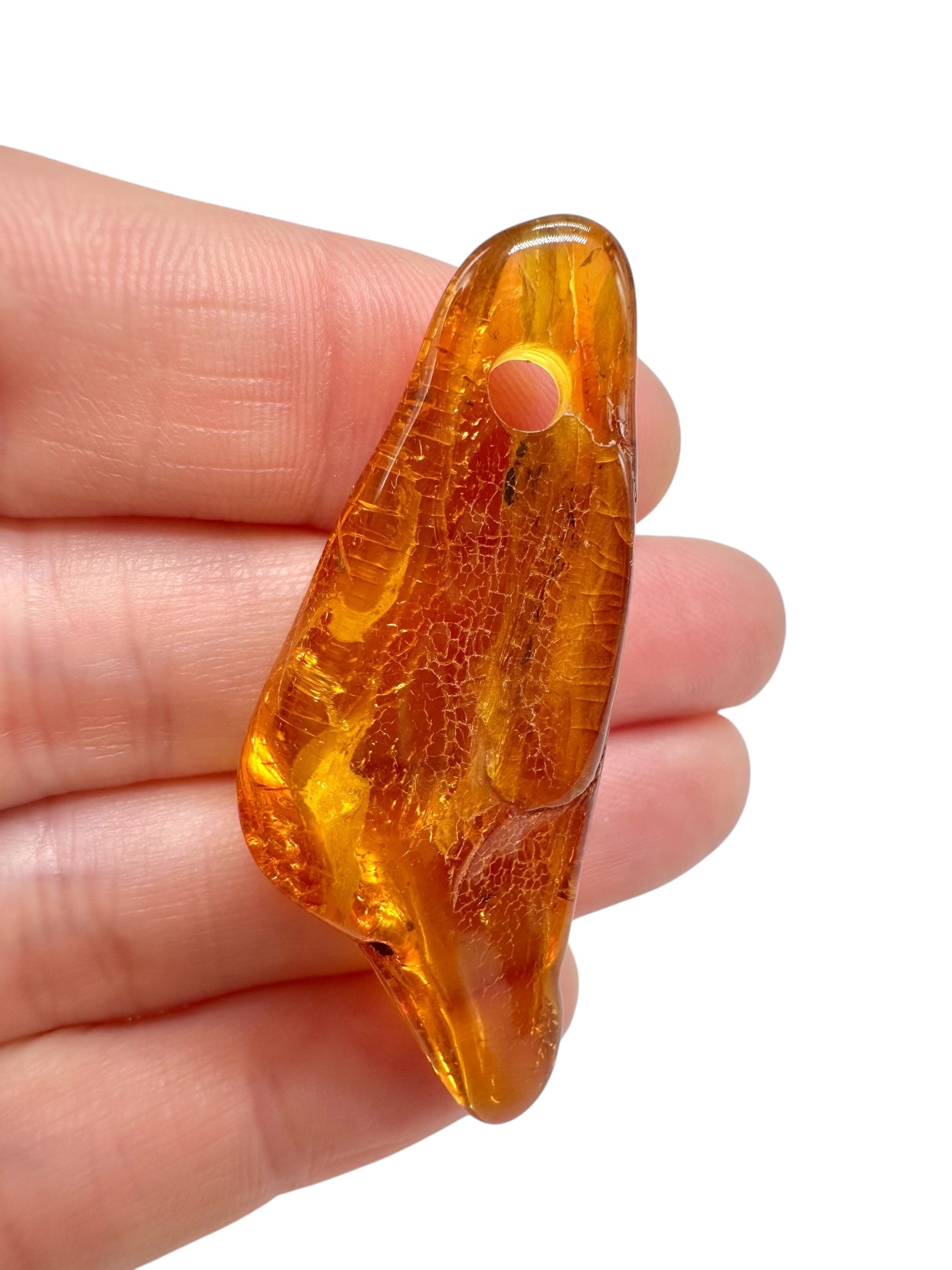 Amber with a drilled hole for hanging 3,5g – Lithuania - JND134