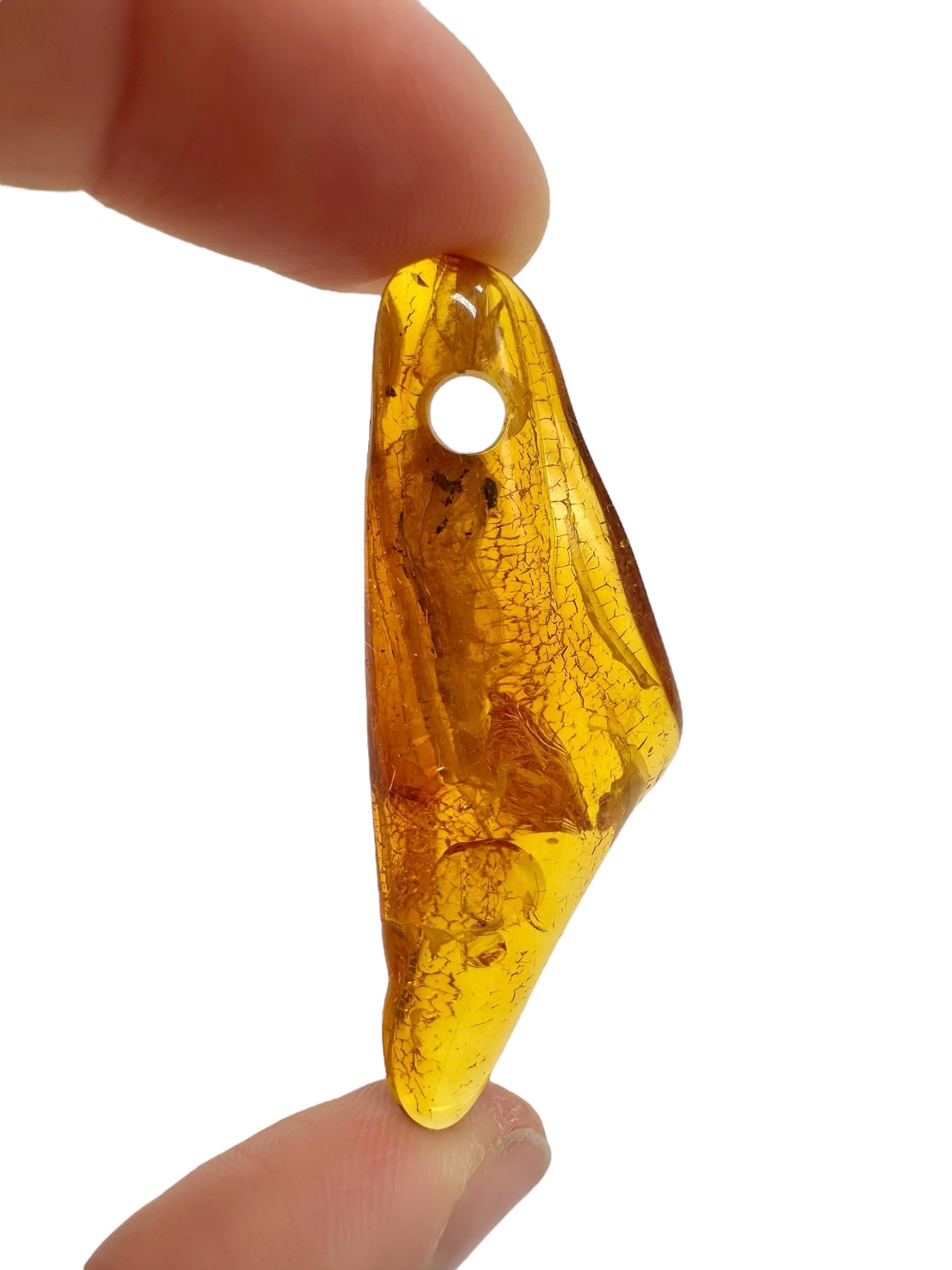 Amber with a drilled hole for hanging 3,5g – Lithuania - JND134