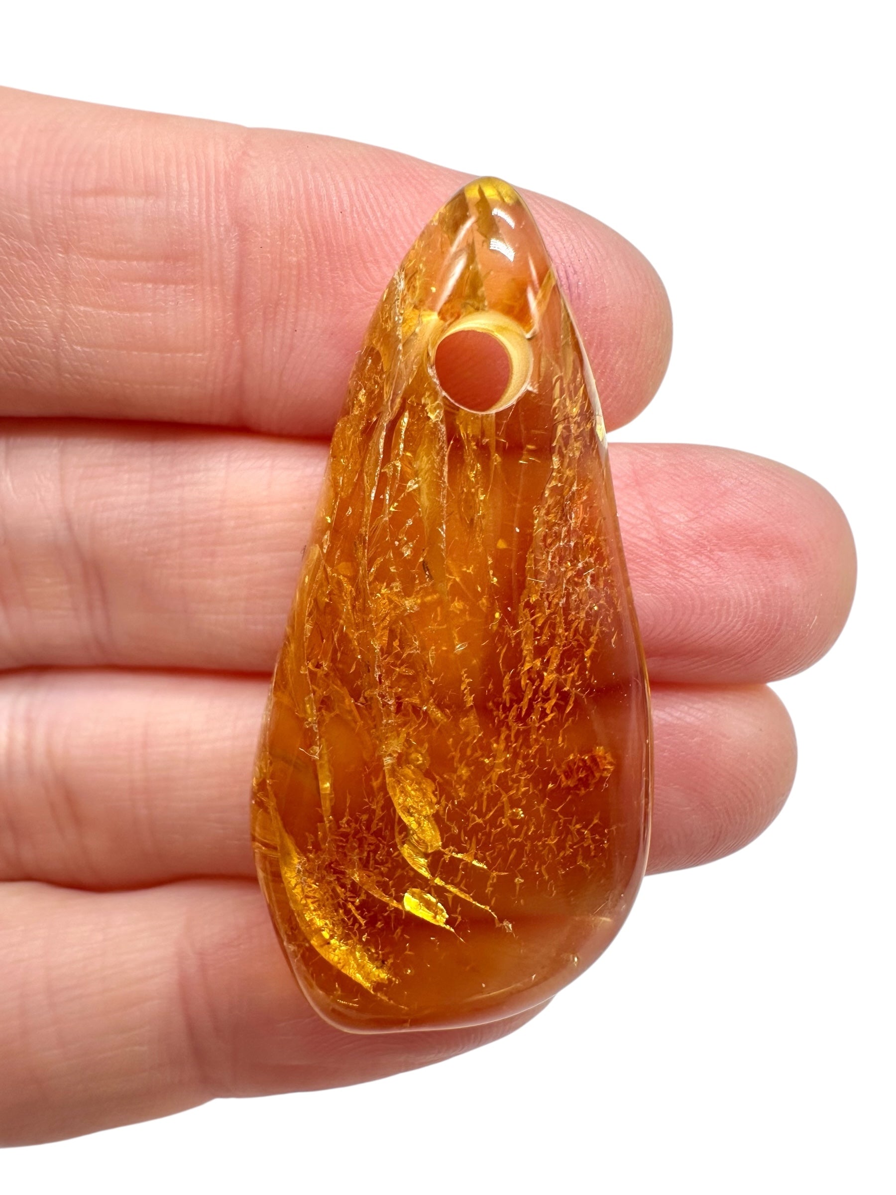 Amber with a drilled hole for hanging 3,6g – Lithuania