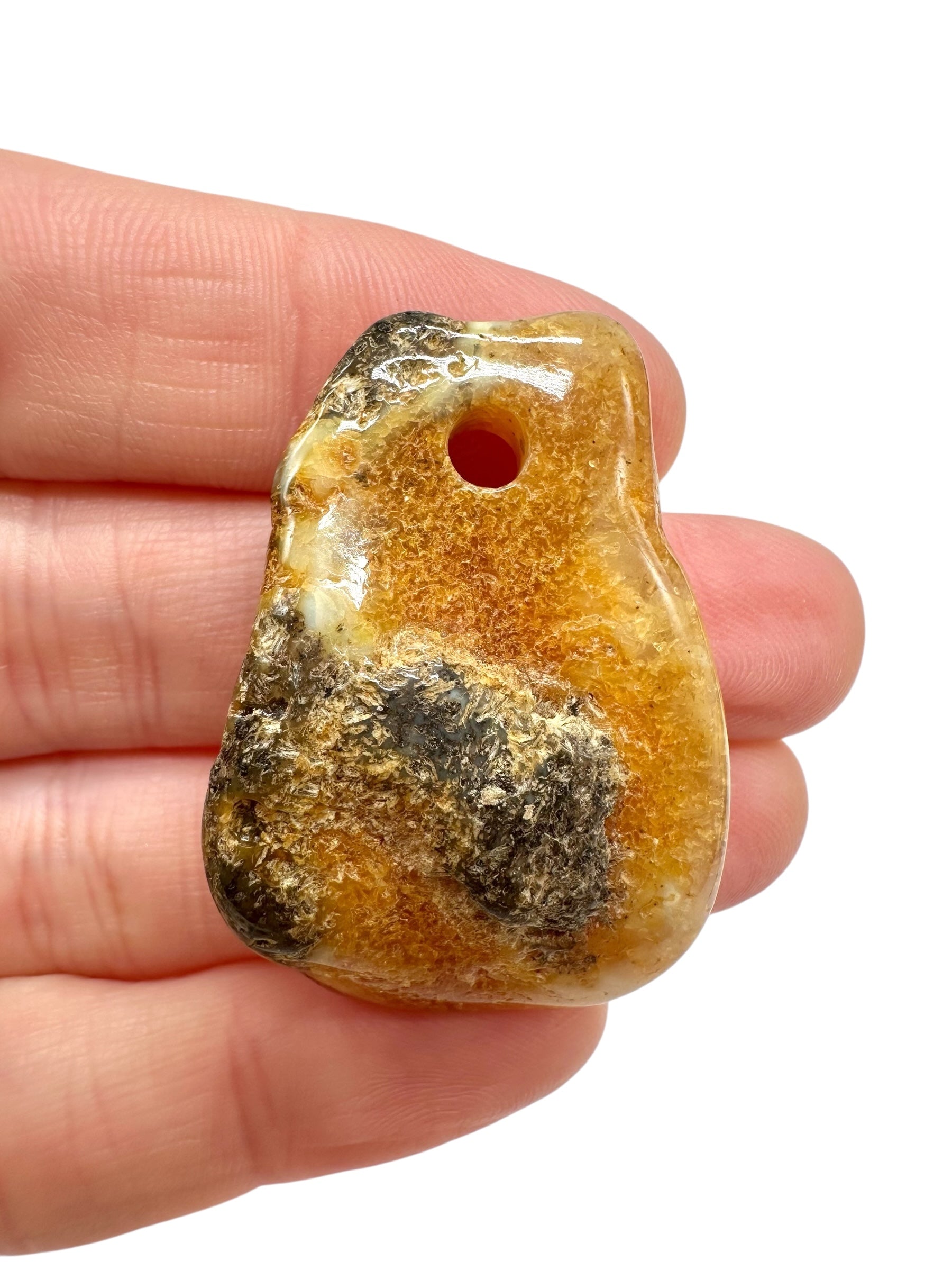 Amber with a drilled hole for hanging 4g – Lithuania