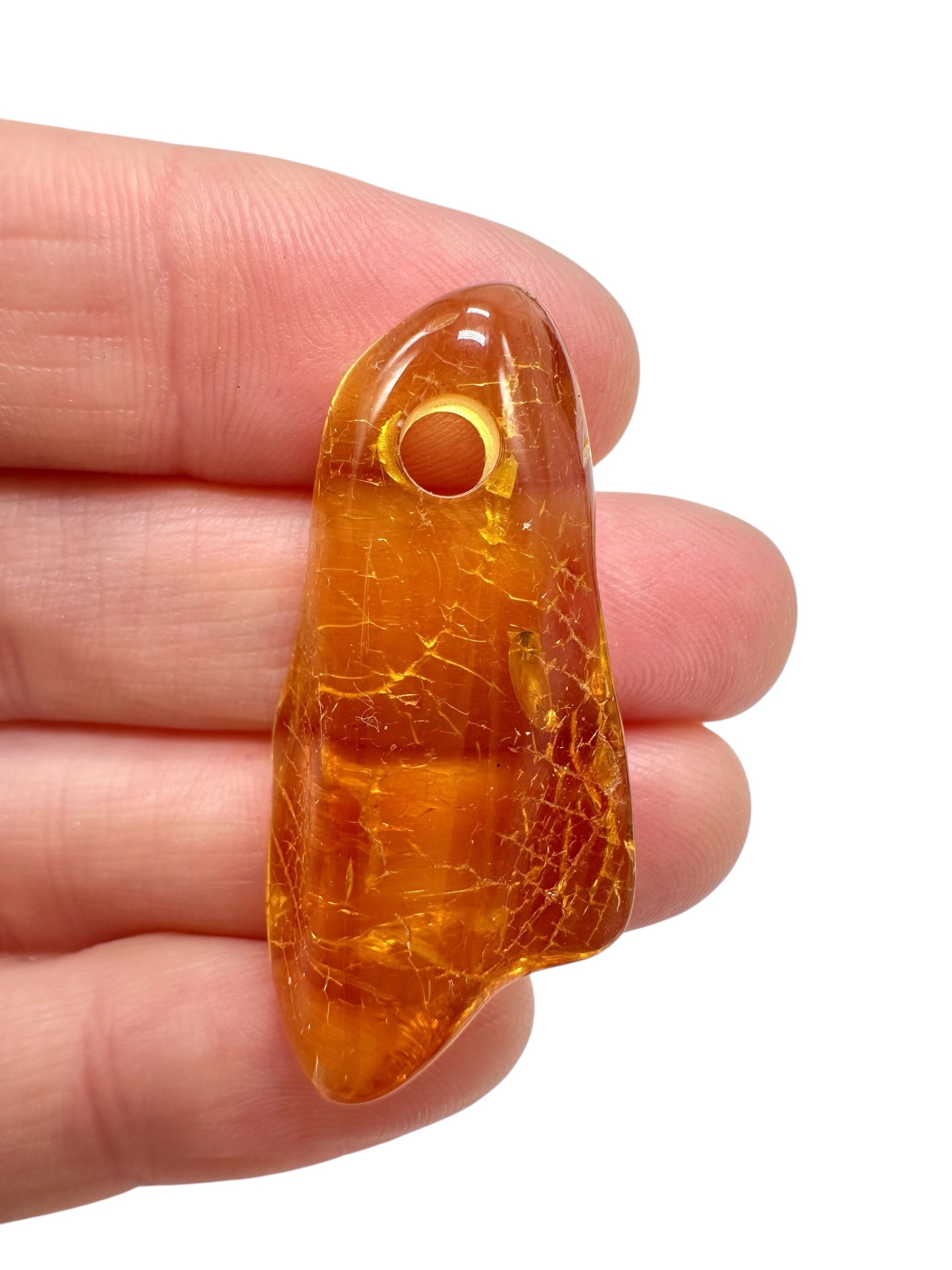 Amber with a drilled hole for hanging 2,4g – Lithuania - JND137