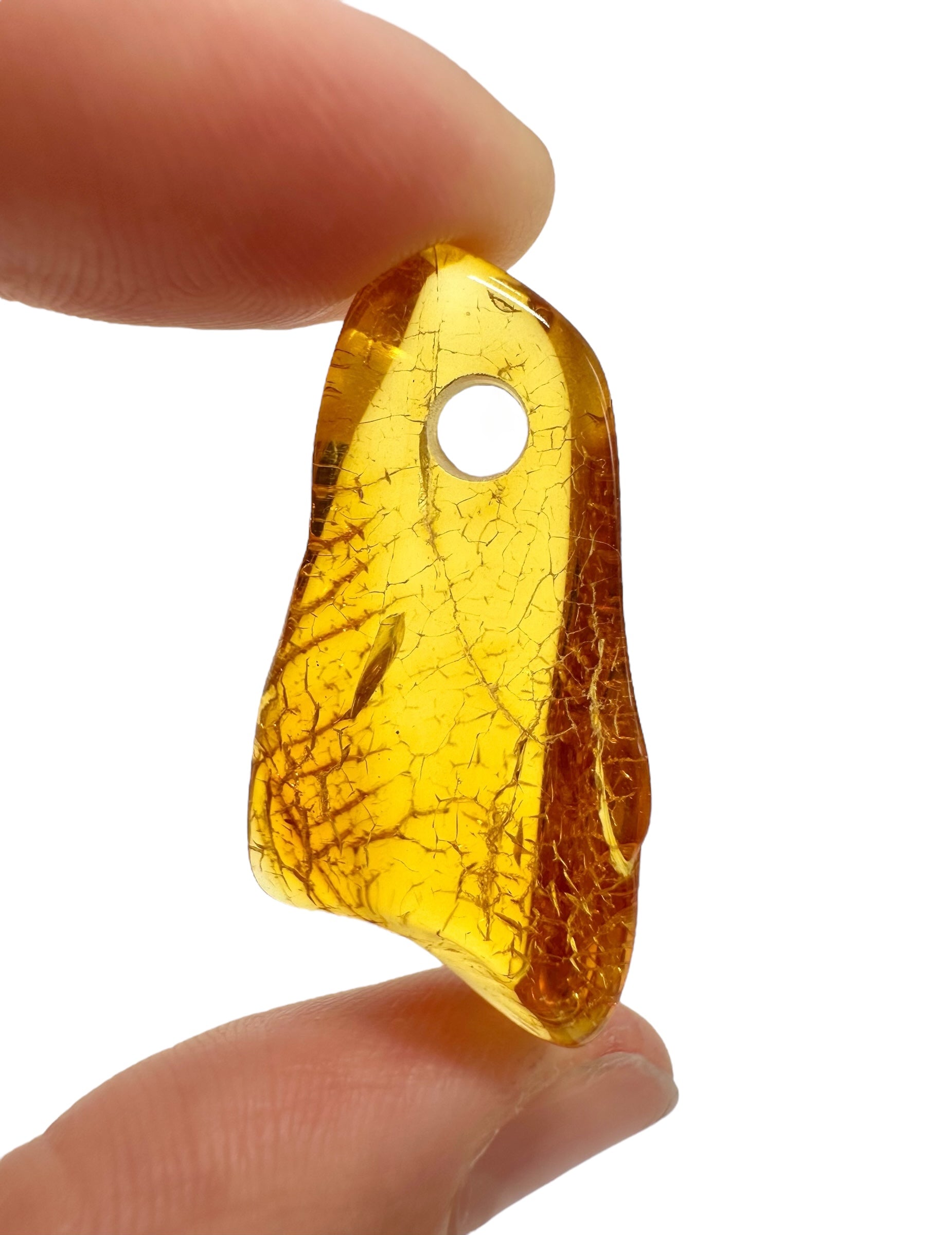 Amber with a drilled hole for hanging 2,4g – Lithuania - JND137