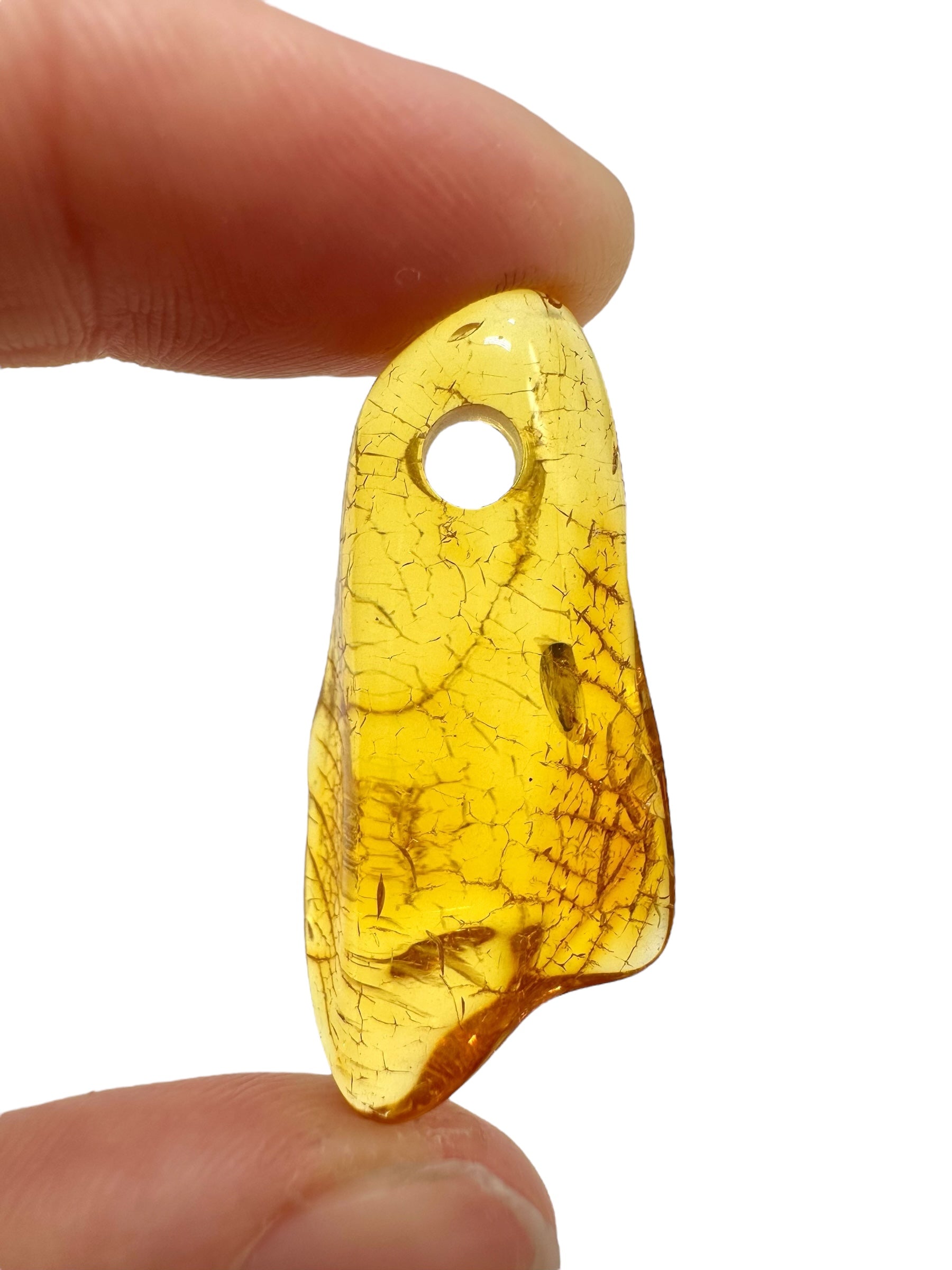 Amber with a drilled hole for hanging 2,4g – Lithuania - JND137