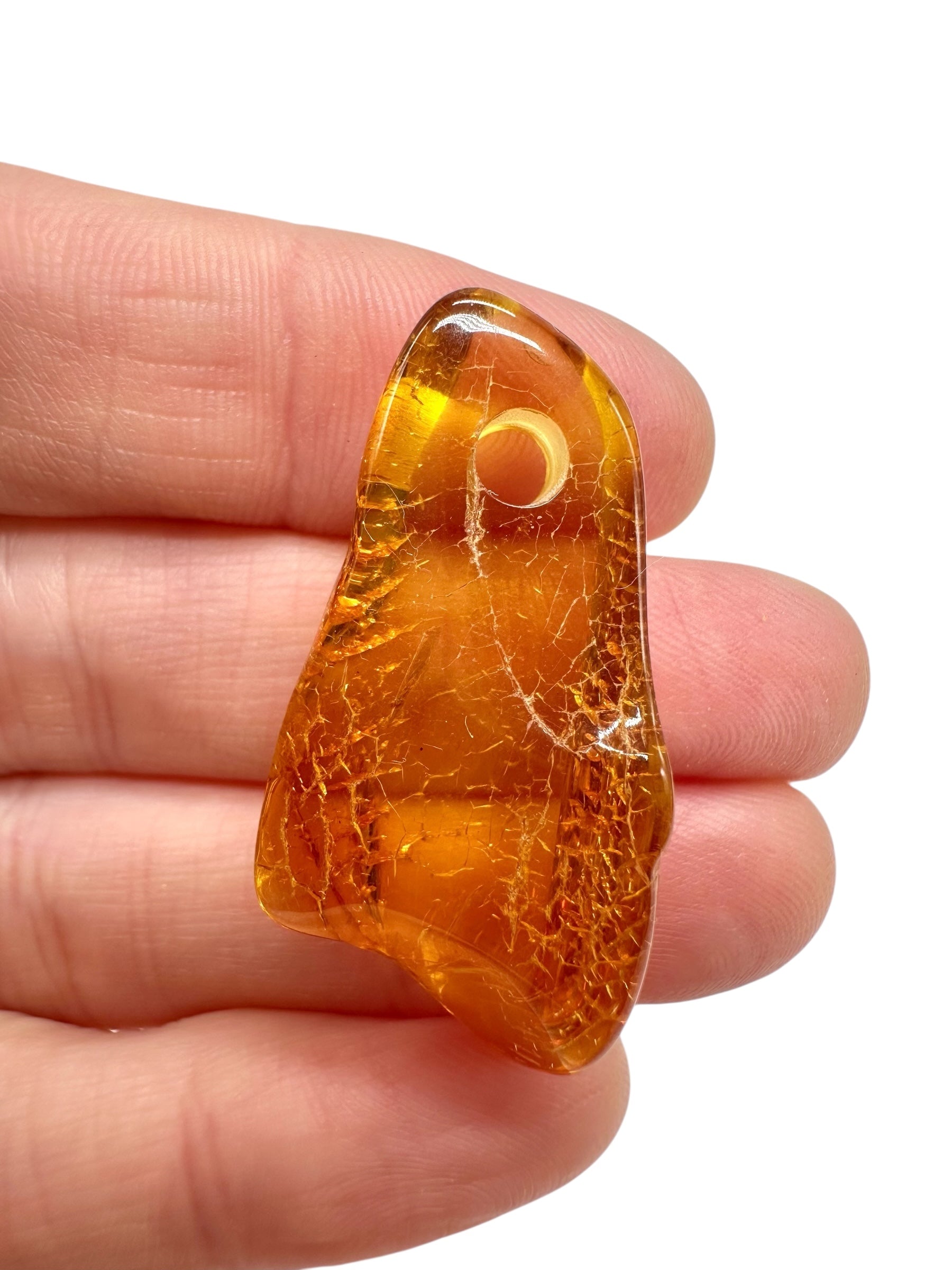 Amber with a drilled hole for hanging 2,4g – Lithuania