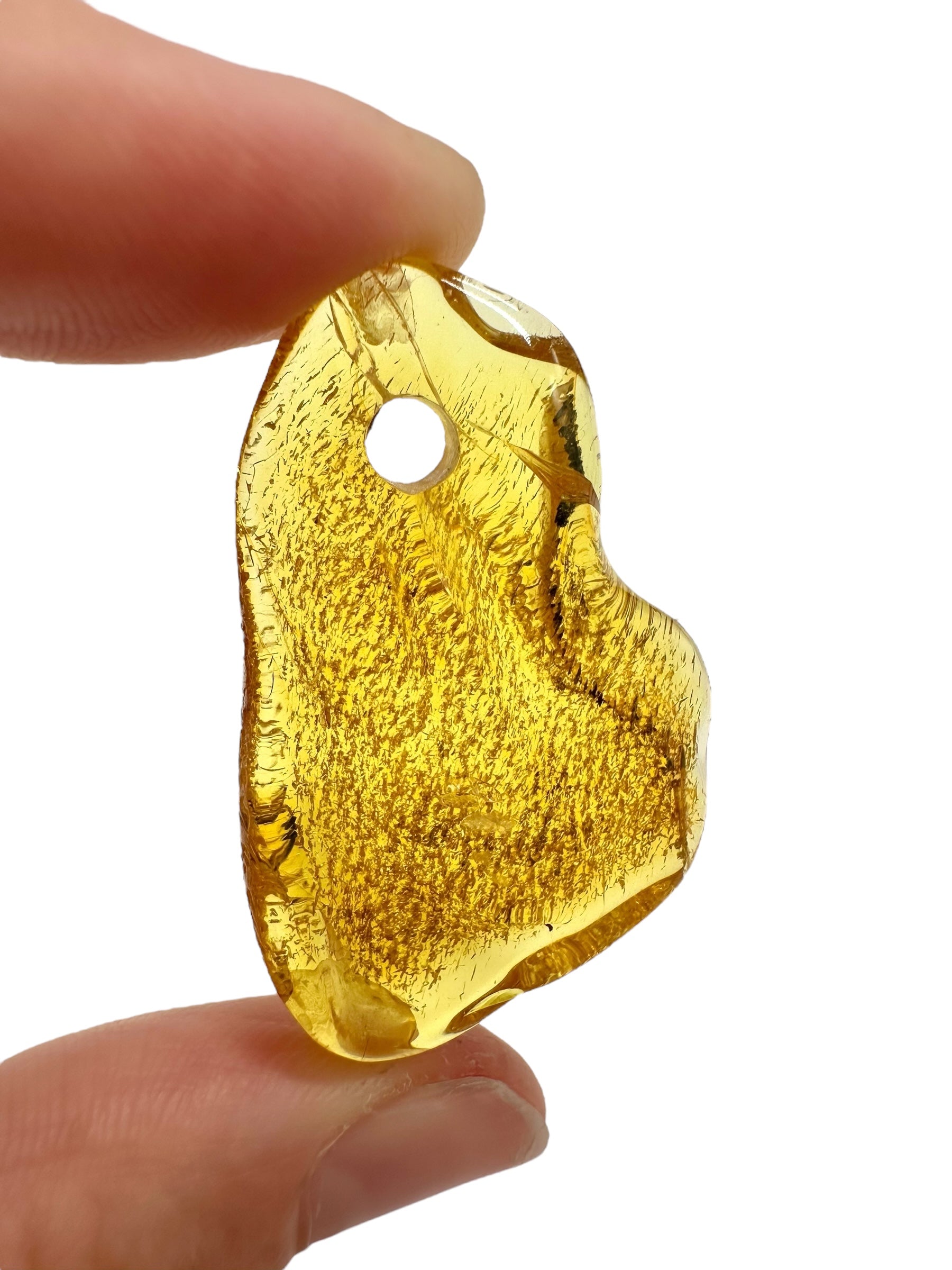 Amber with a drilled hole for hanging 2,8g – Lithuania - JND140