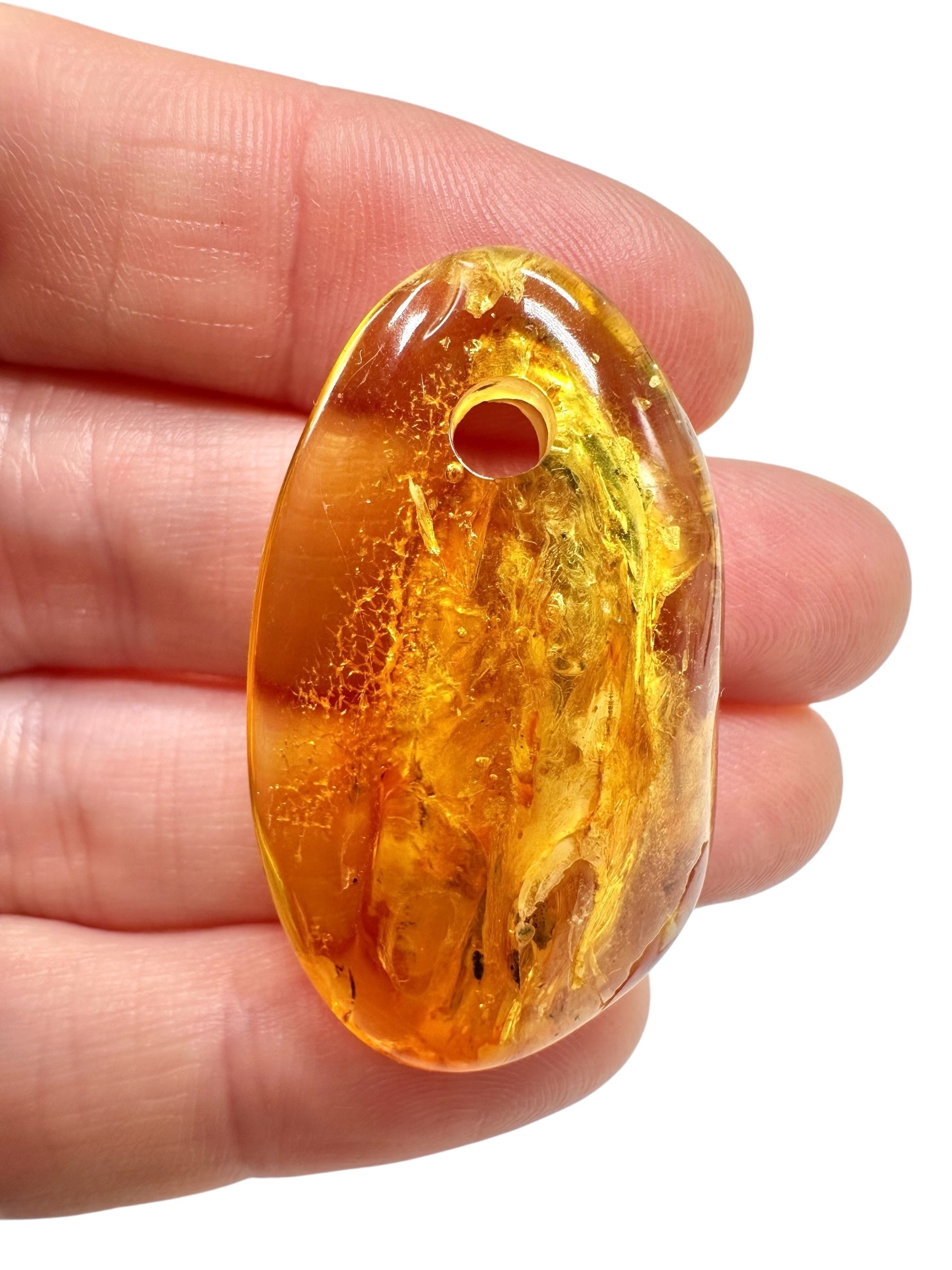 Amber with a drilled hole for hanging 3,7g – Lithuania