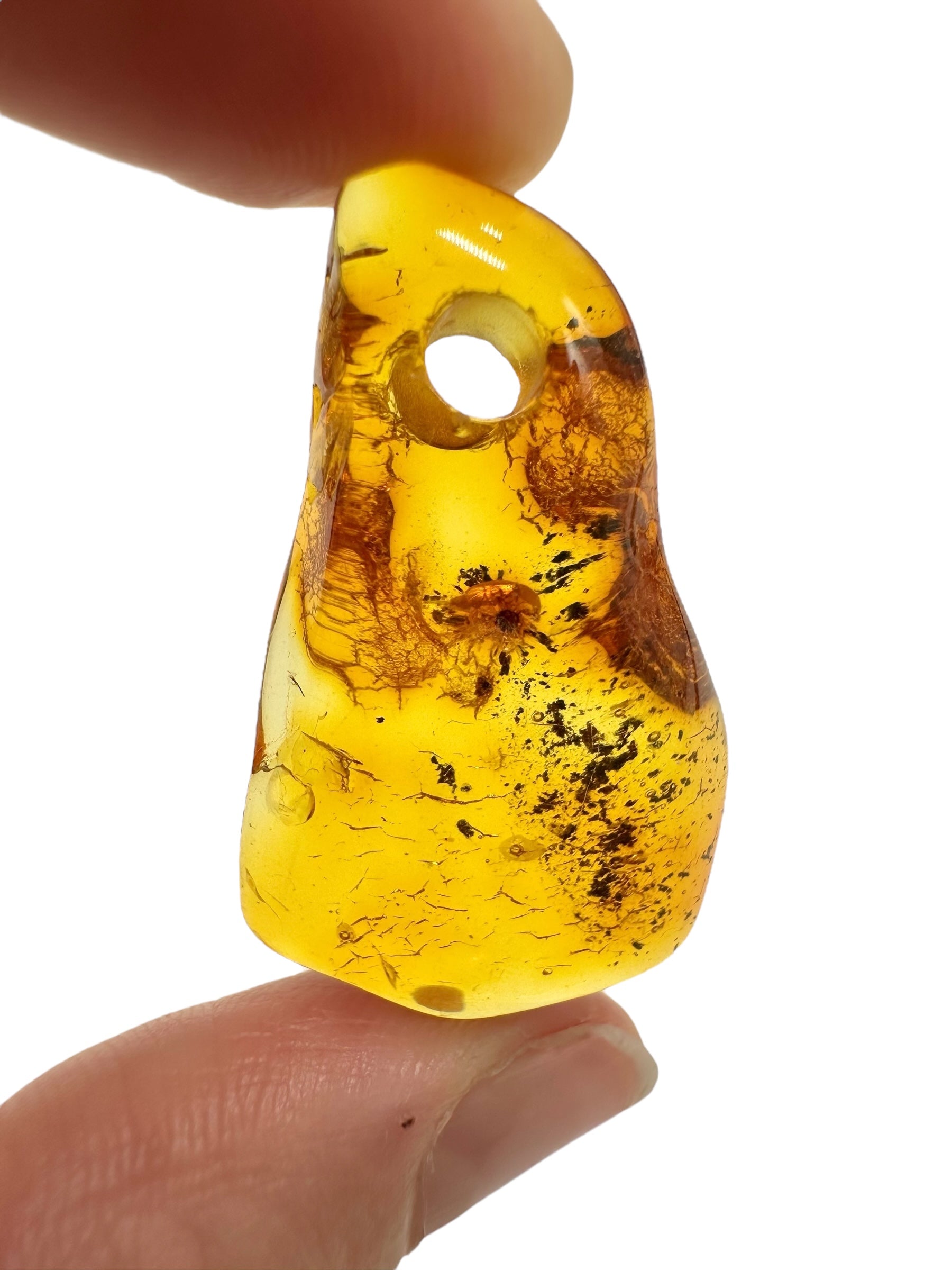 Amber with a drilled hole for hanging 2,7g – Lithuania - JND142