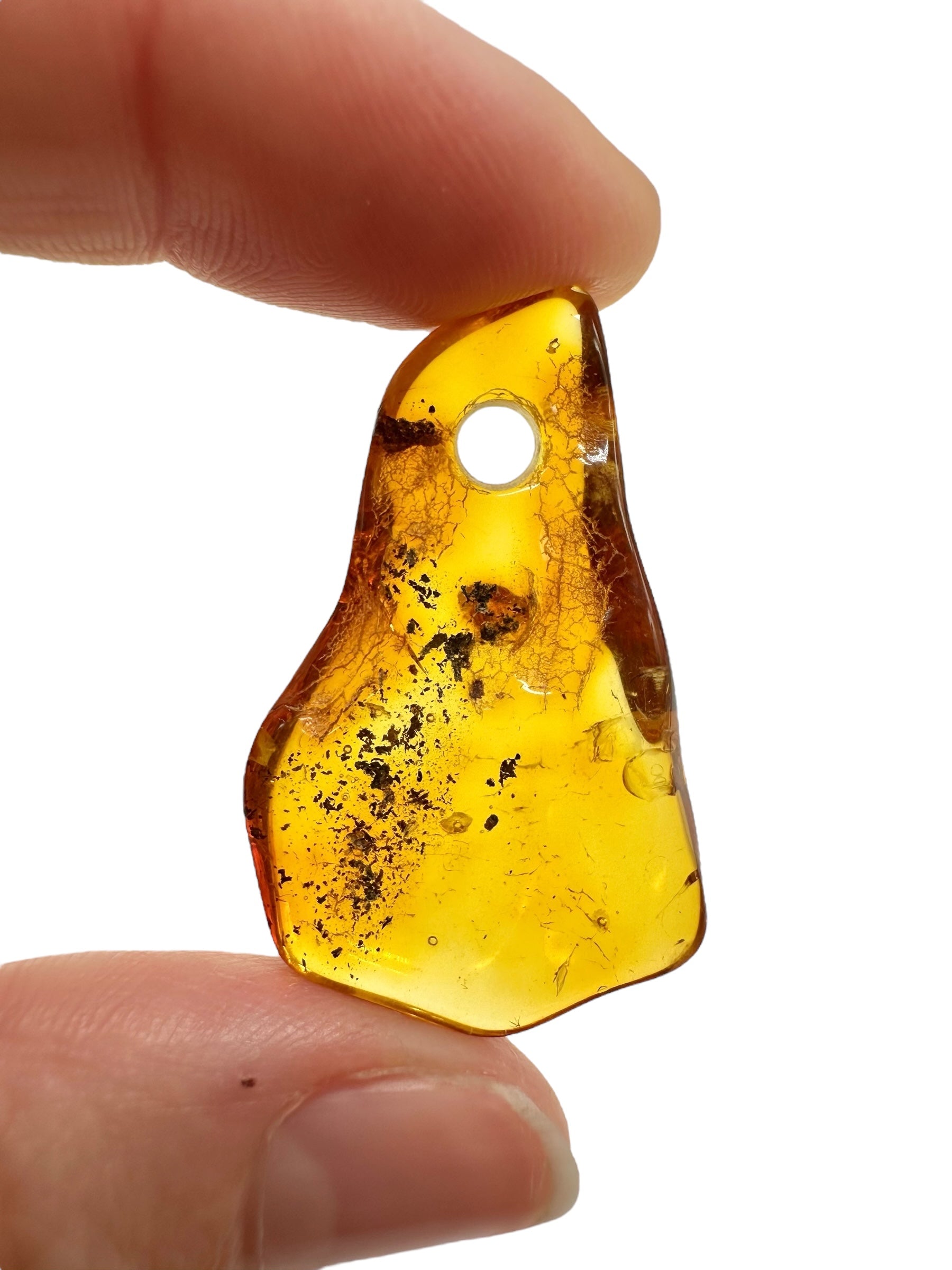 Amber with a drilled hole for hanging 2,7g – Lithuania - JND142