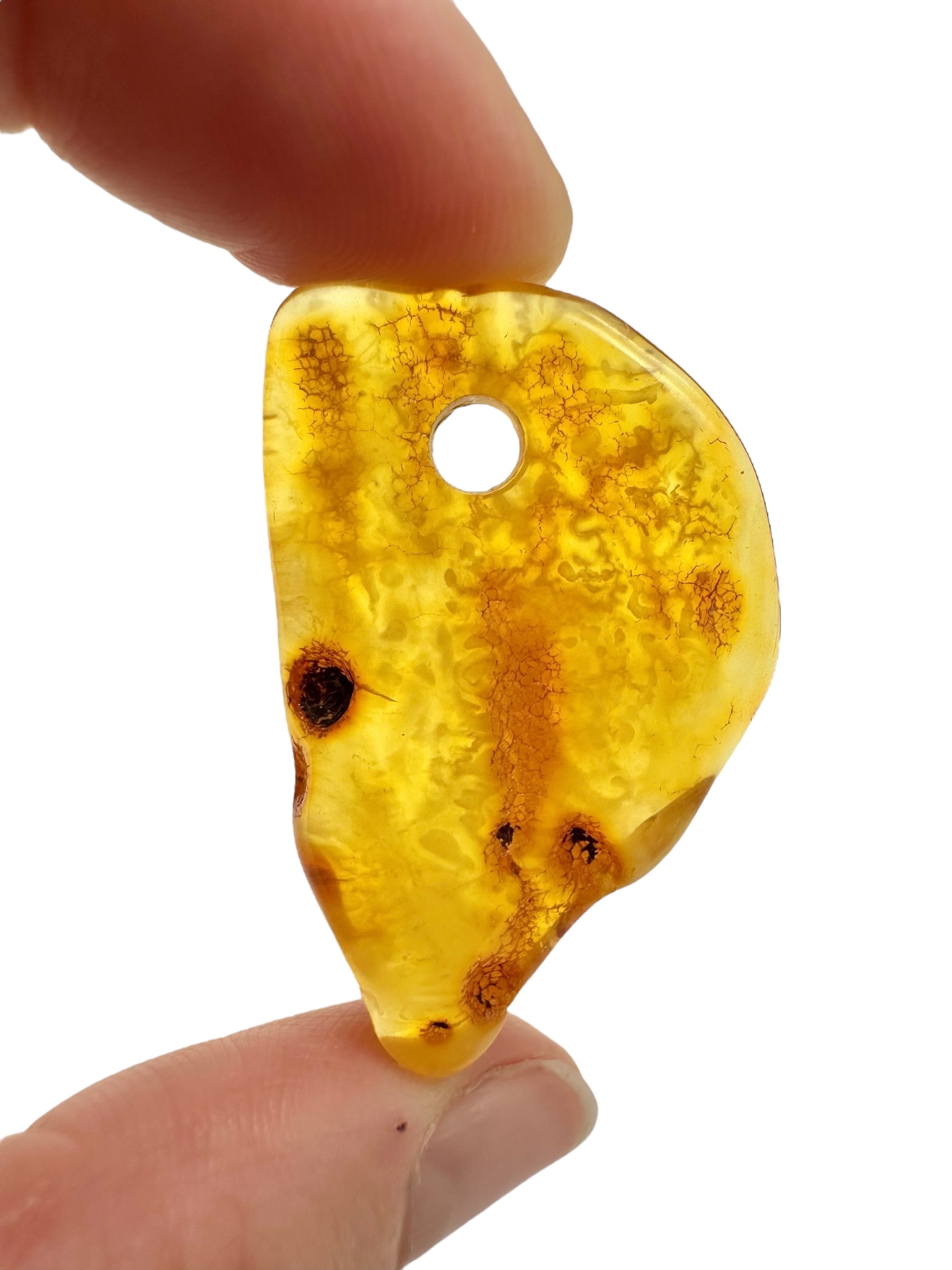 Amber with a drilled hole for hanging 3,7g – Lithuania - JND144