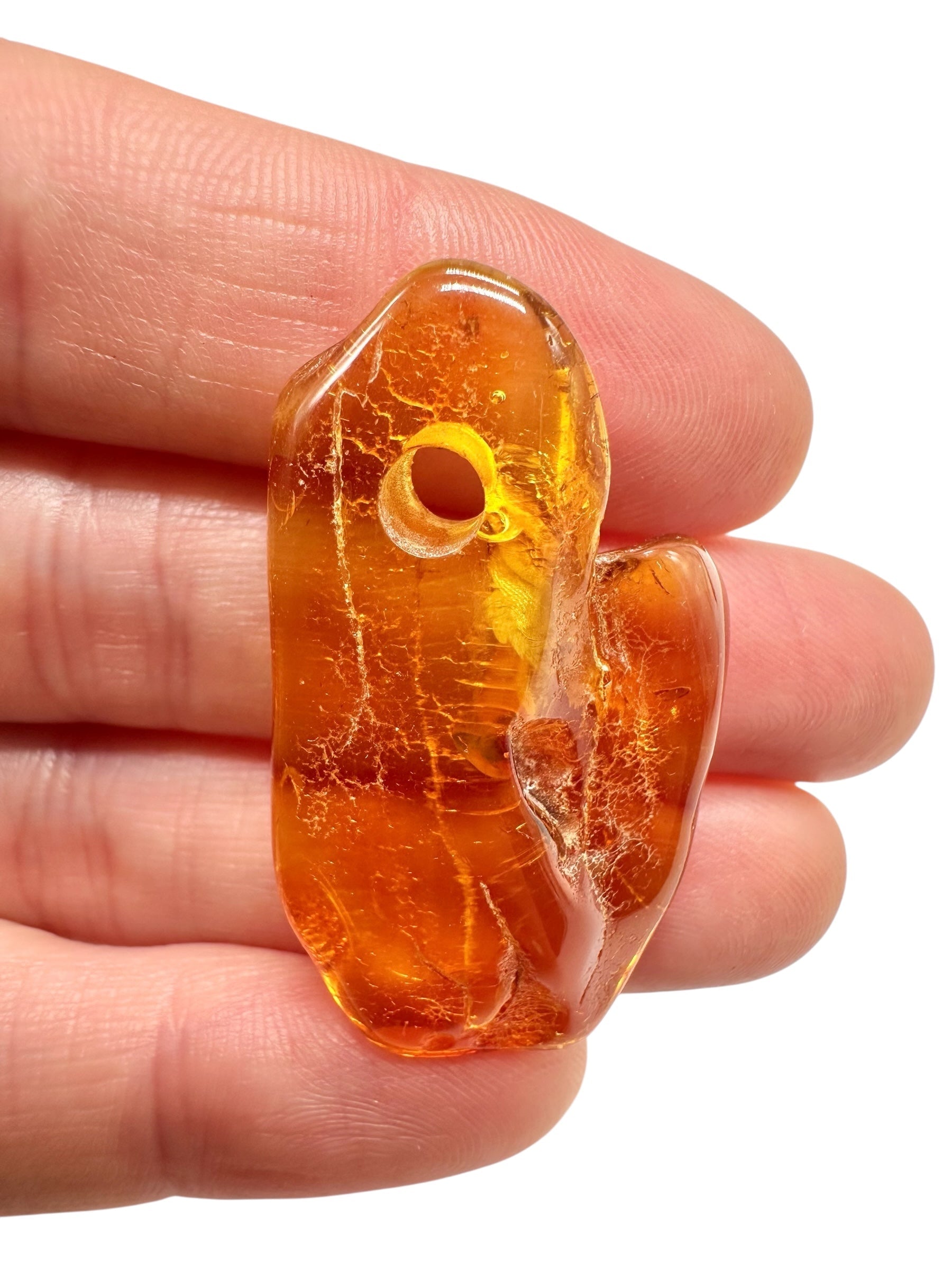 Amber with a drilled hole for hanging 3,6g – Lithuania
