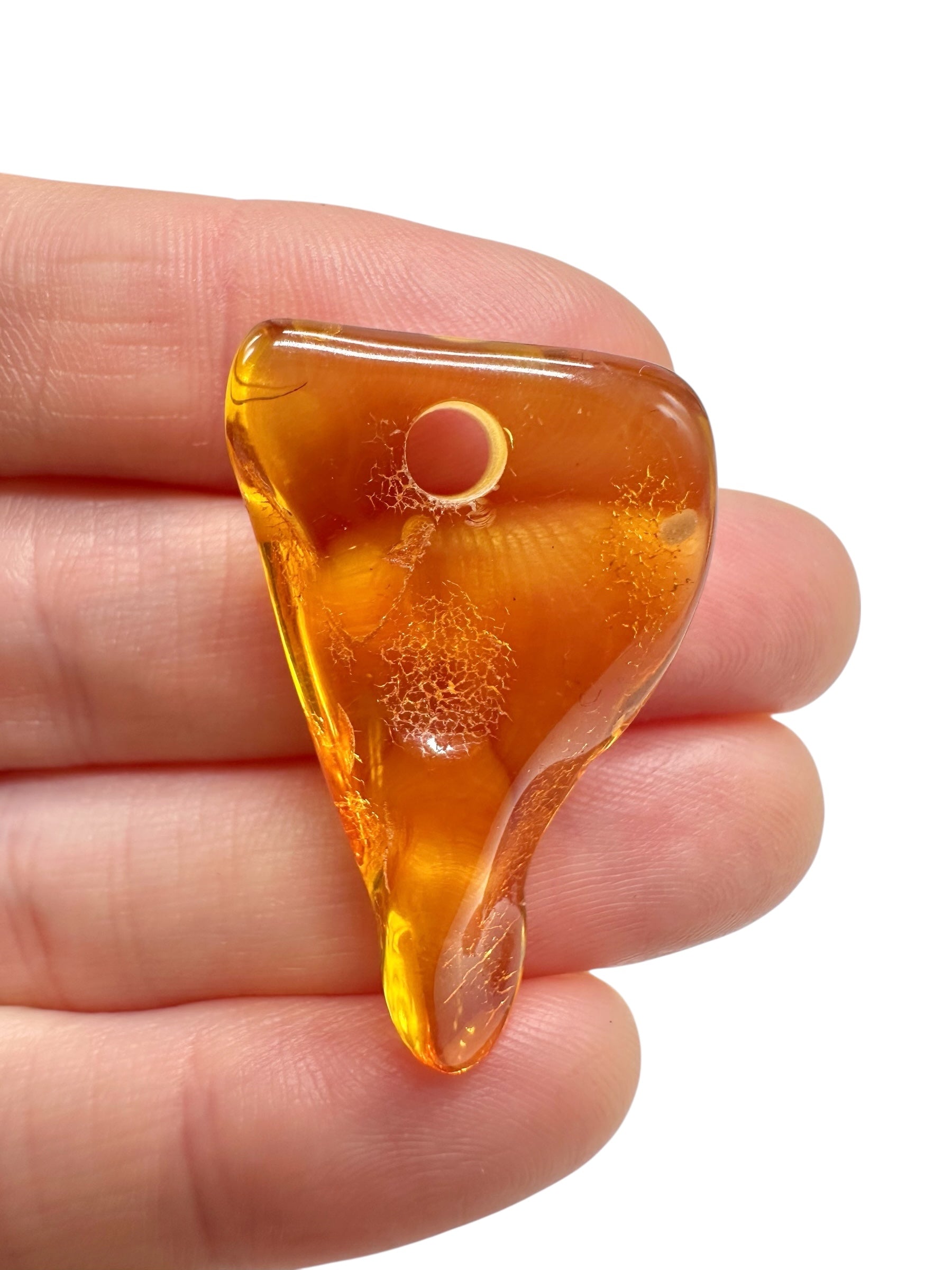 Amber with a drilled hole for hanging 2,4g – Lithuania - JND146