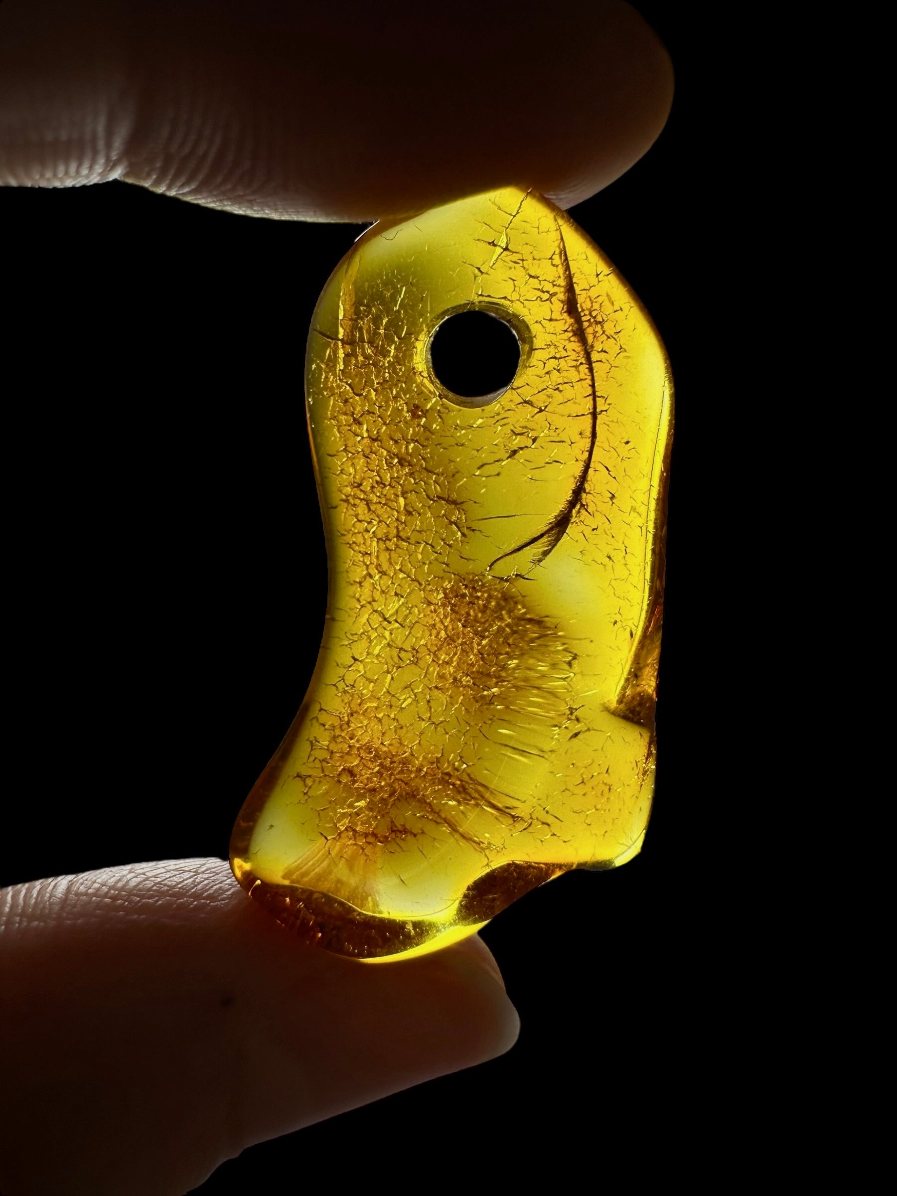 Amber with a drilled hole for hanging 2,8g – Lithuania - JND147