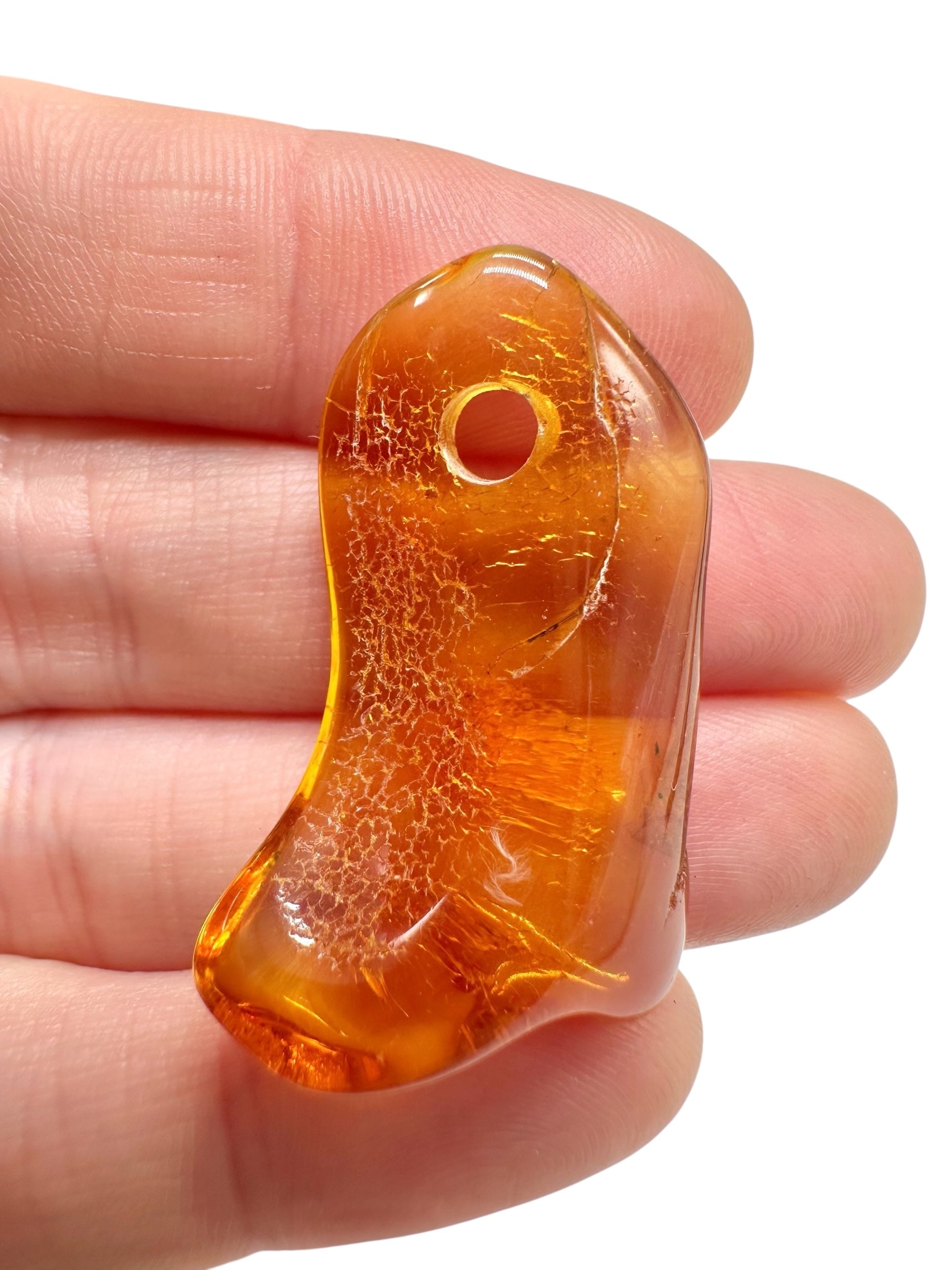 Amber with a drilled hole for hanging 2,8g – Lithuania