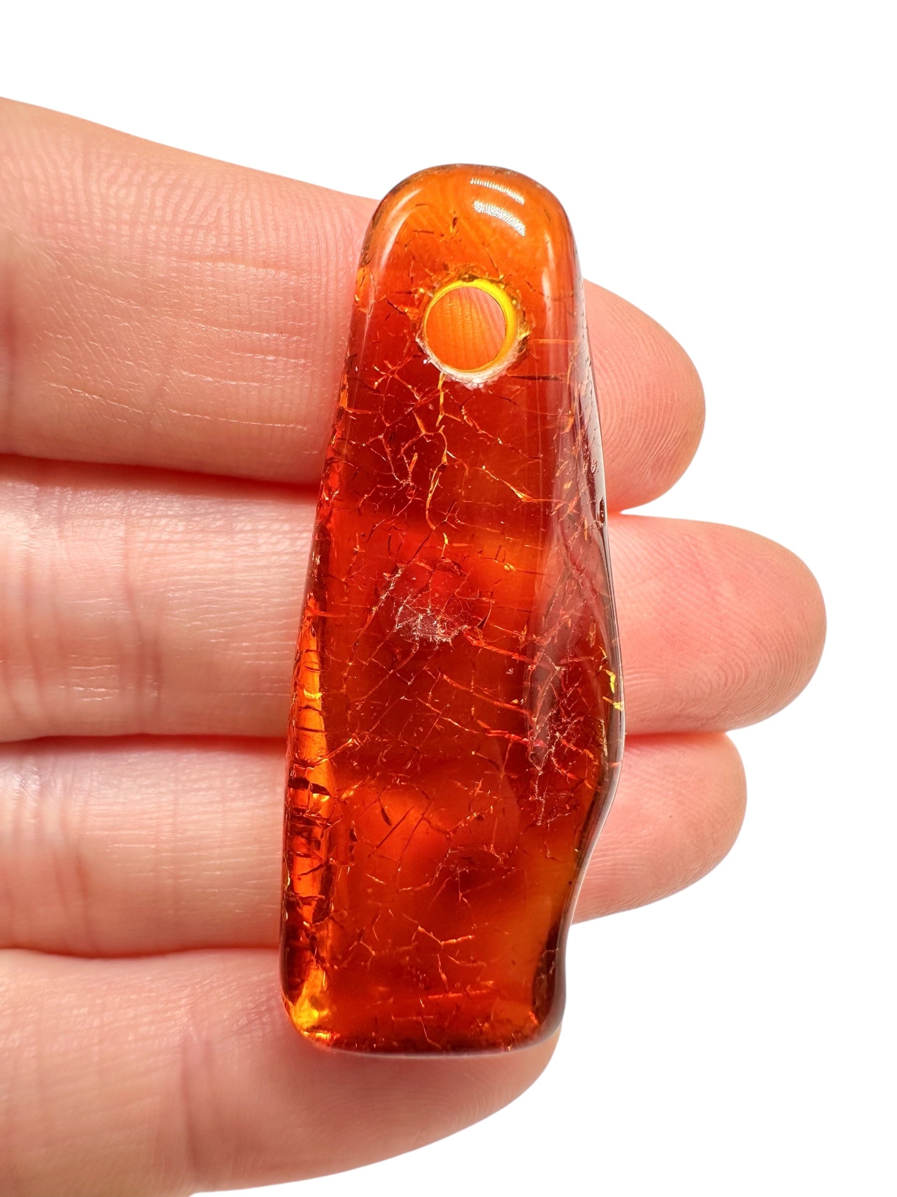 Amber with a drilled hole for hanging 3,7g – Lithuania