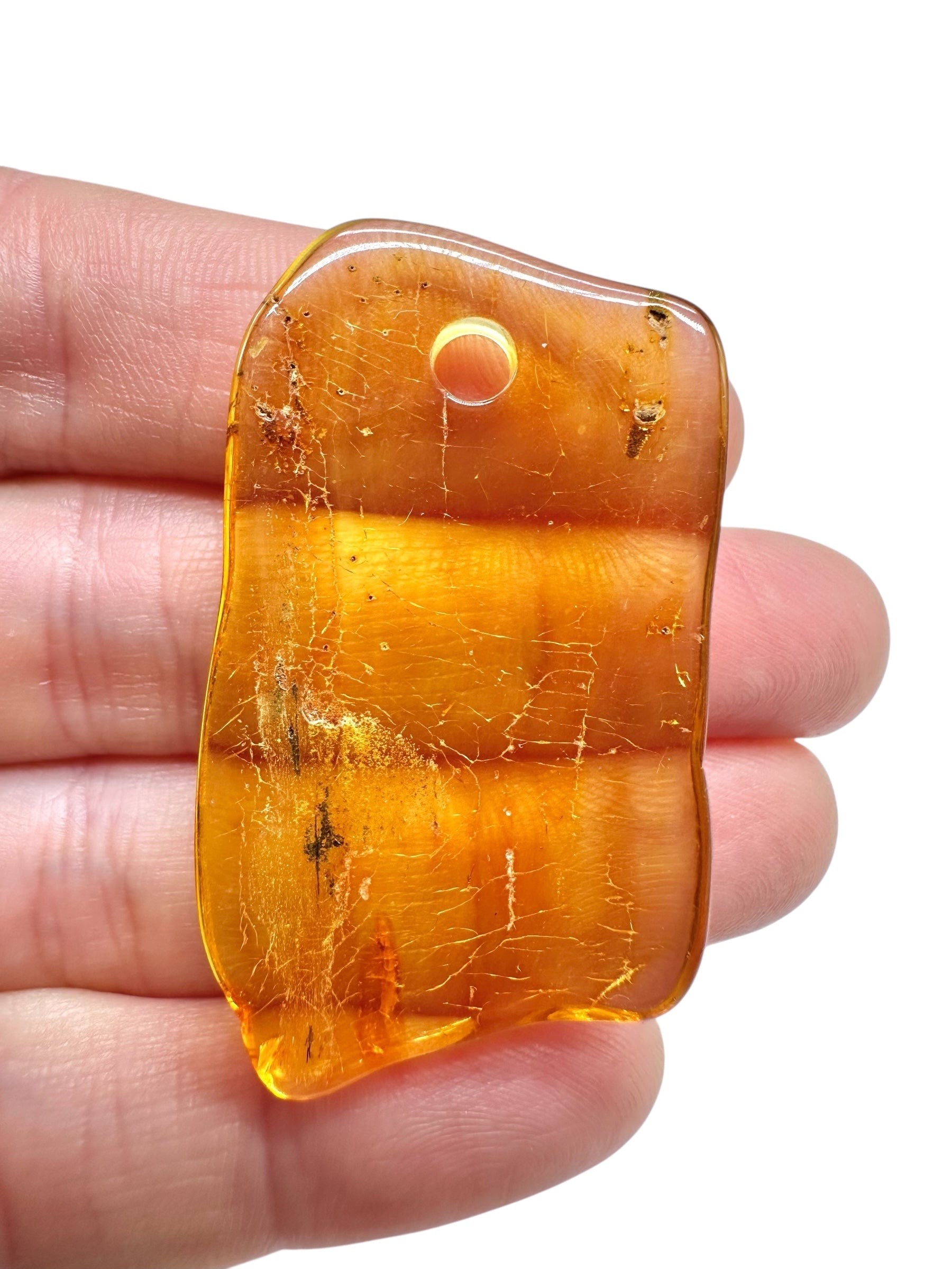 Amber with a drilled hole for hanging 3,1g – Lithuania - JND149
