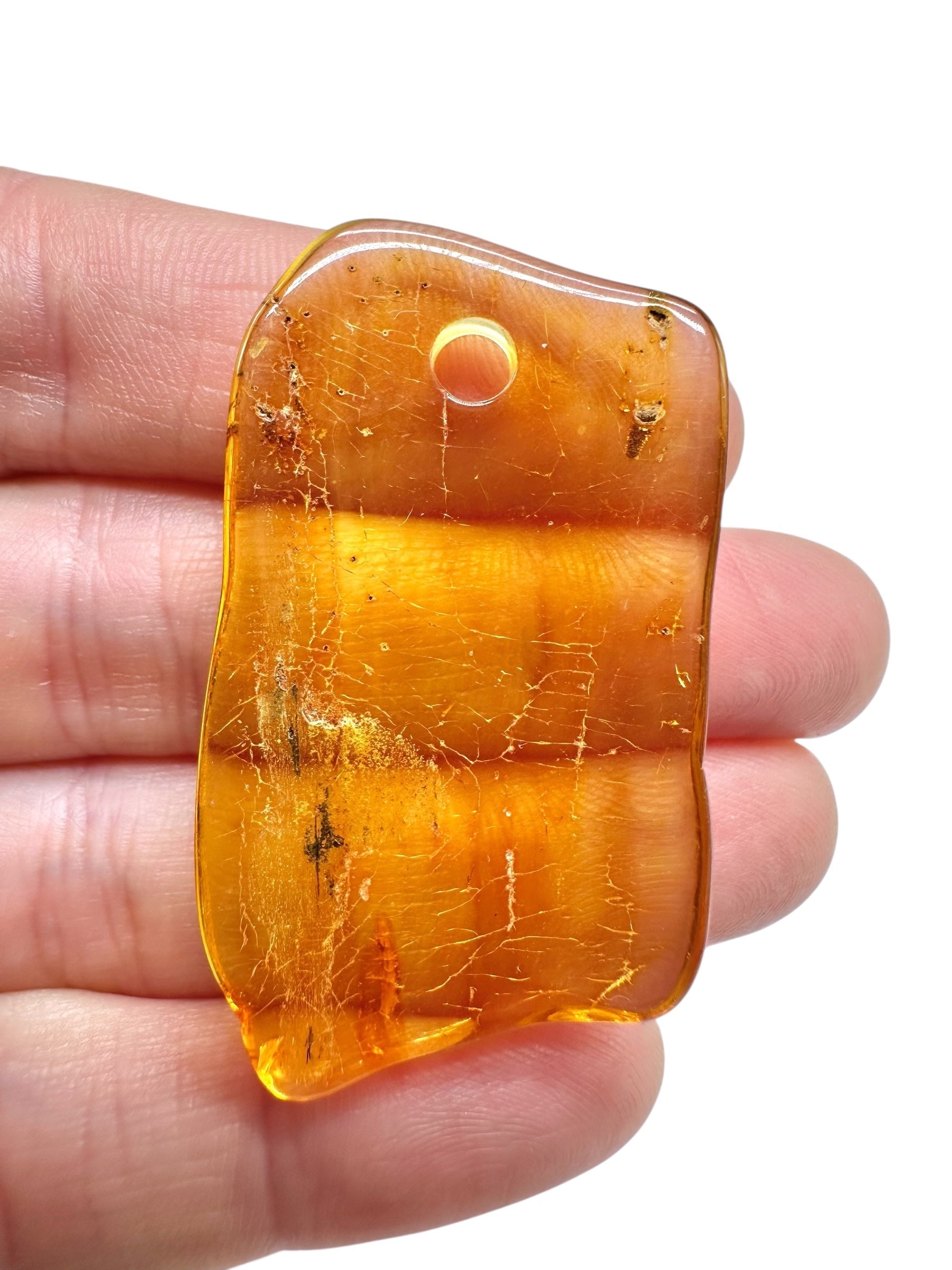 Amber with a drilled hole for hanging 3,1g – Lithuania - JND149