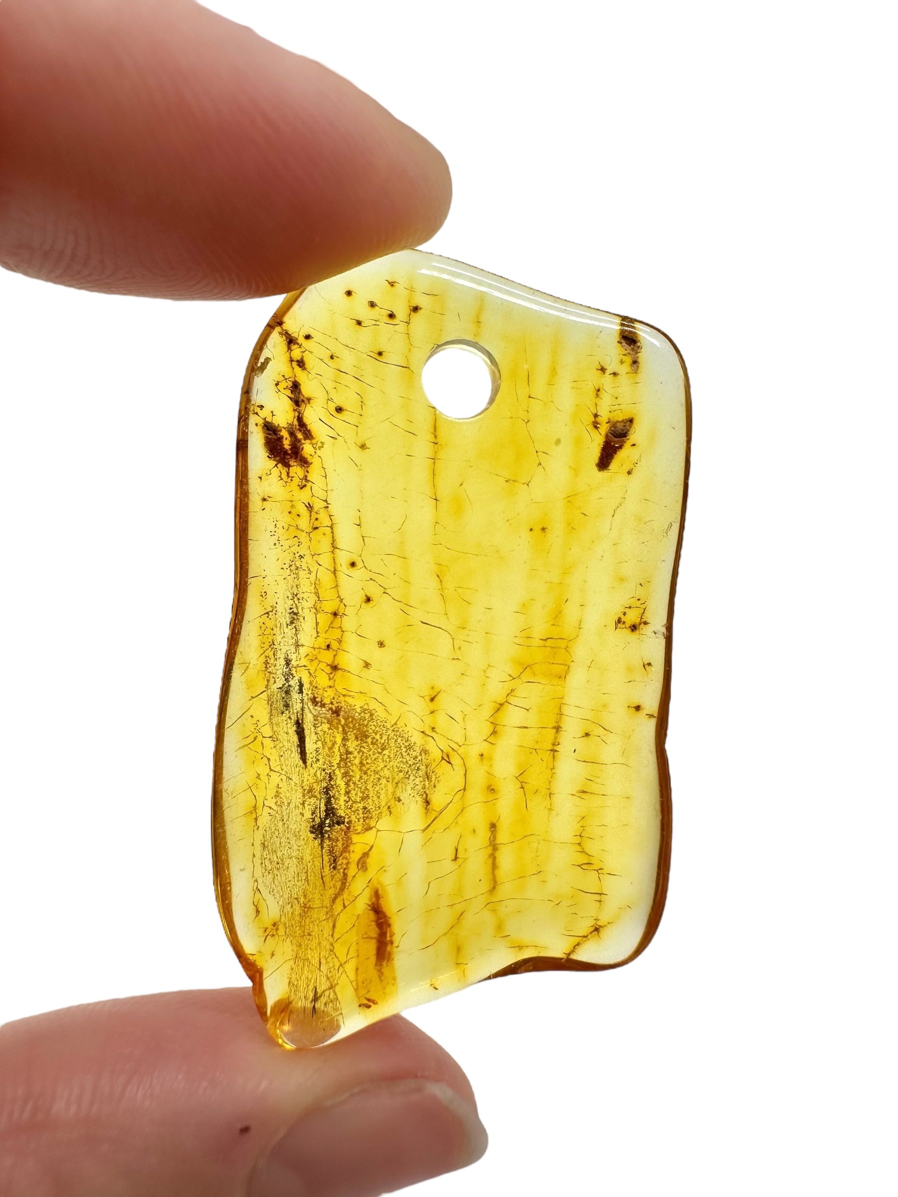 Amber with a drilled hole for hanging 3,1g – Lithuania - JND149
