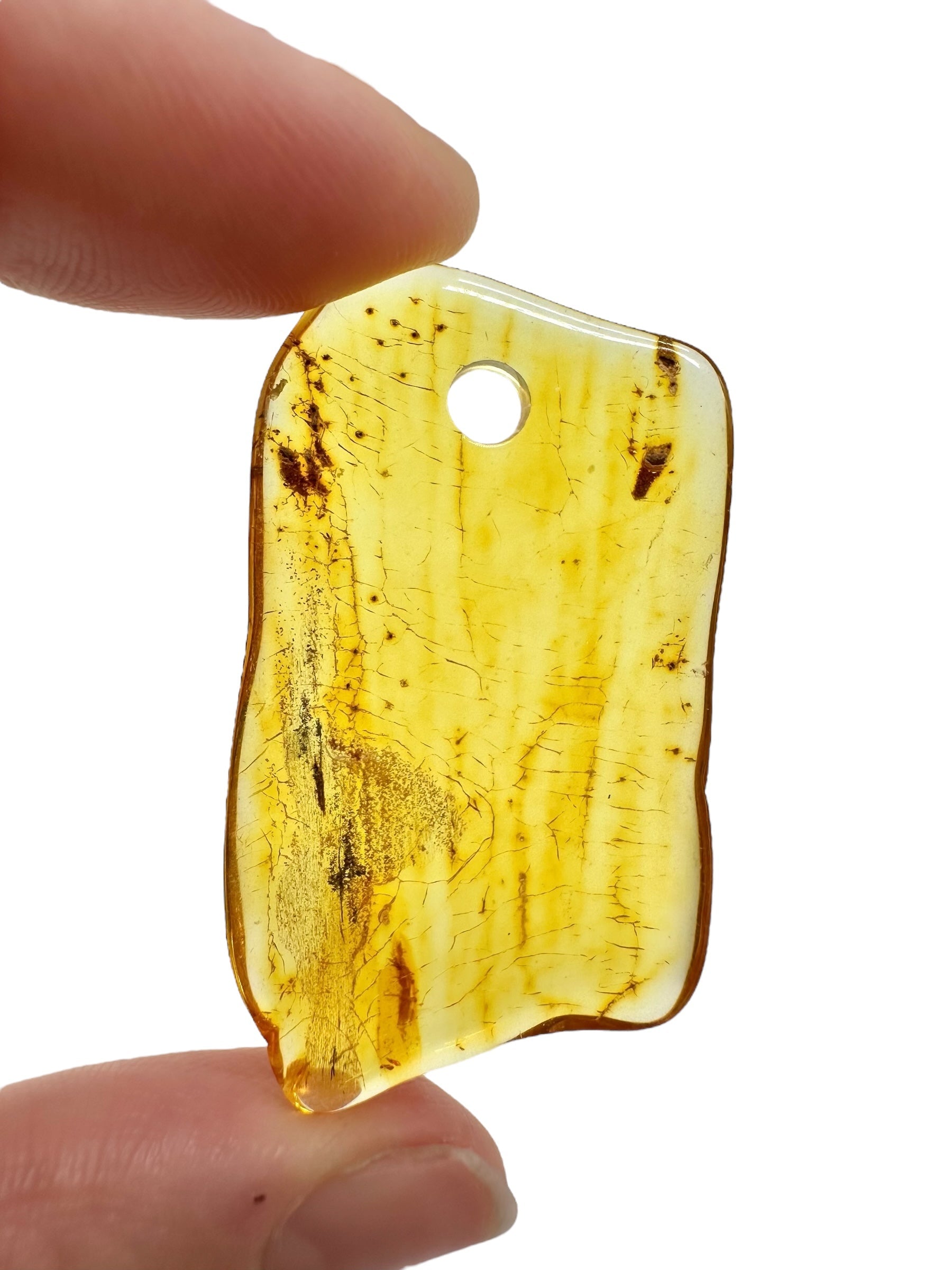 Amber with a drilled hole for hanging 3,1g – Lithuania - JND149