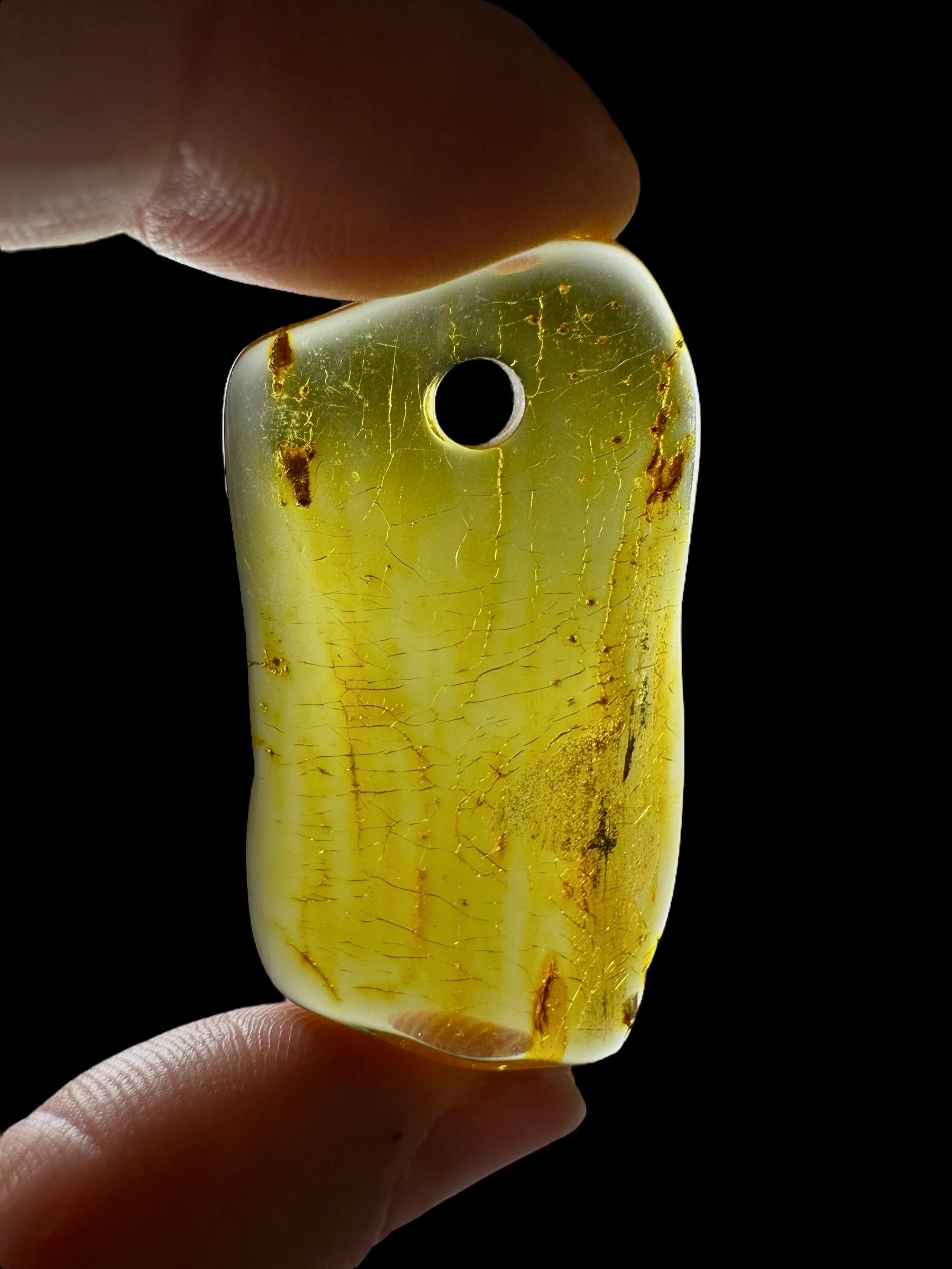 Amber with a drilled hole for hanging 3,1g – Lithuania - JND149