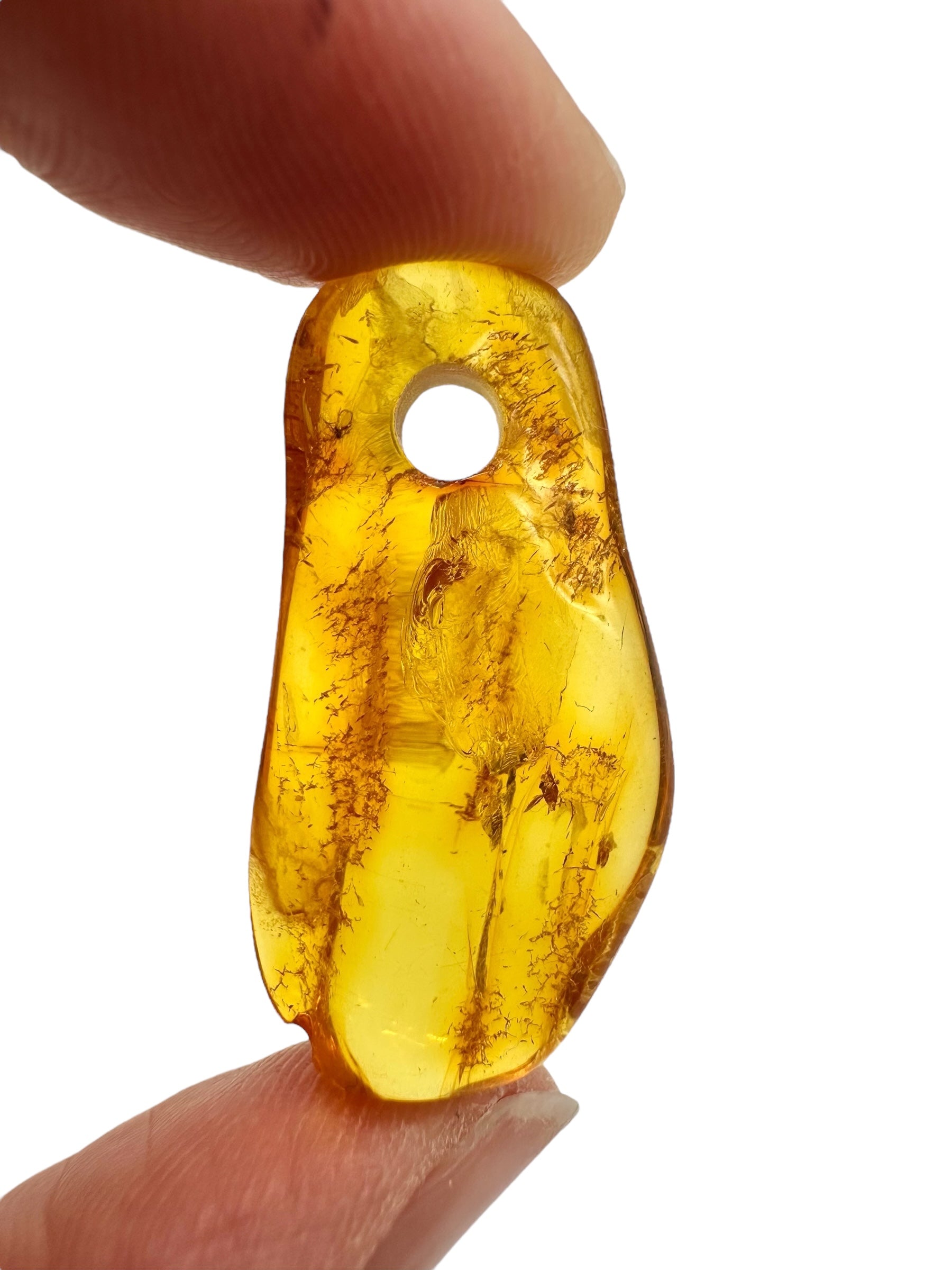 Amber with a drilled hole for hanging 2,3g – Lithuania - JND151