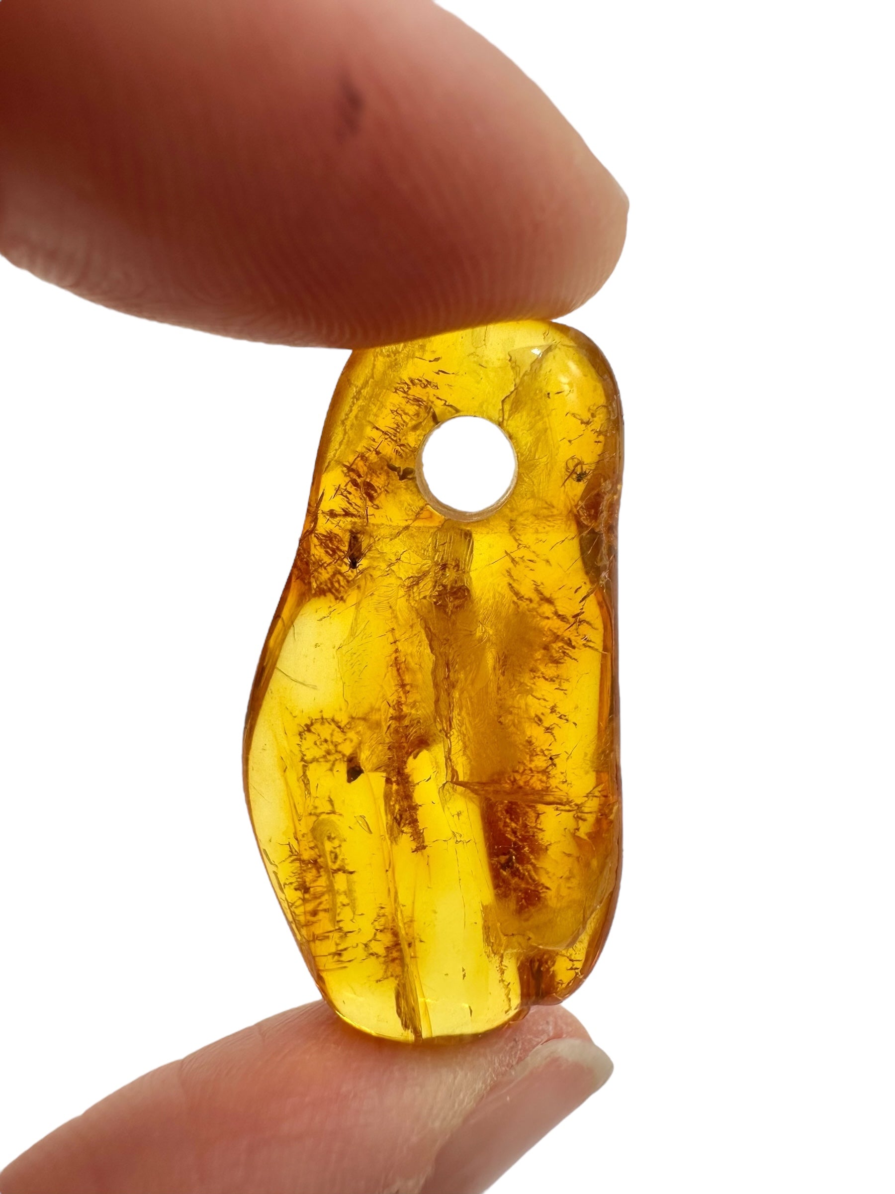 Amber with a drilled hole for hanging 2,3g – Lithuania - JND151