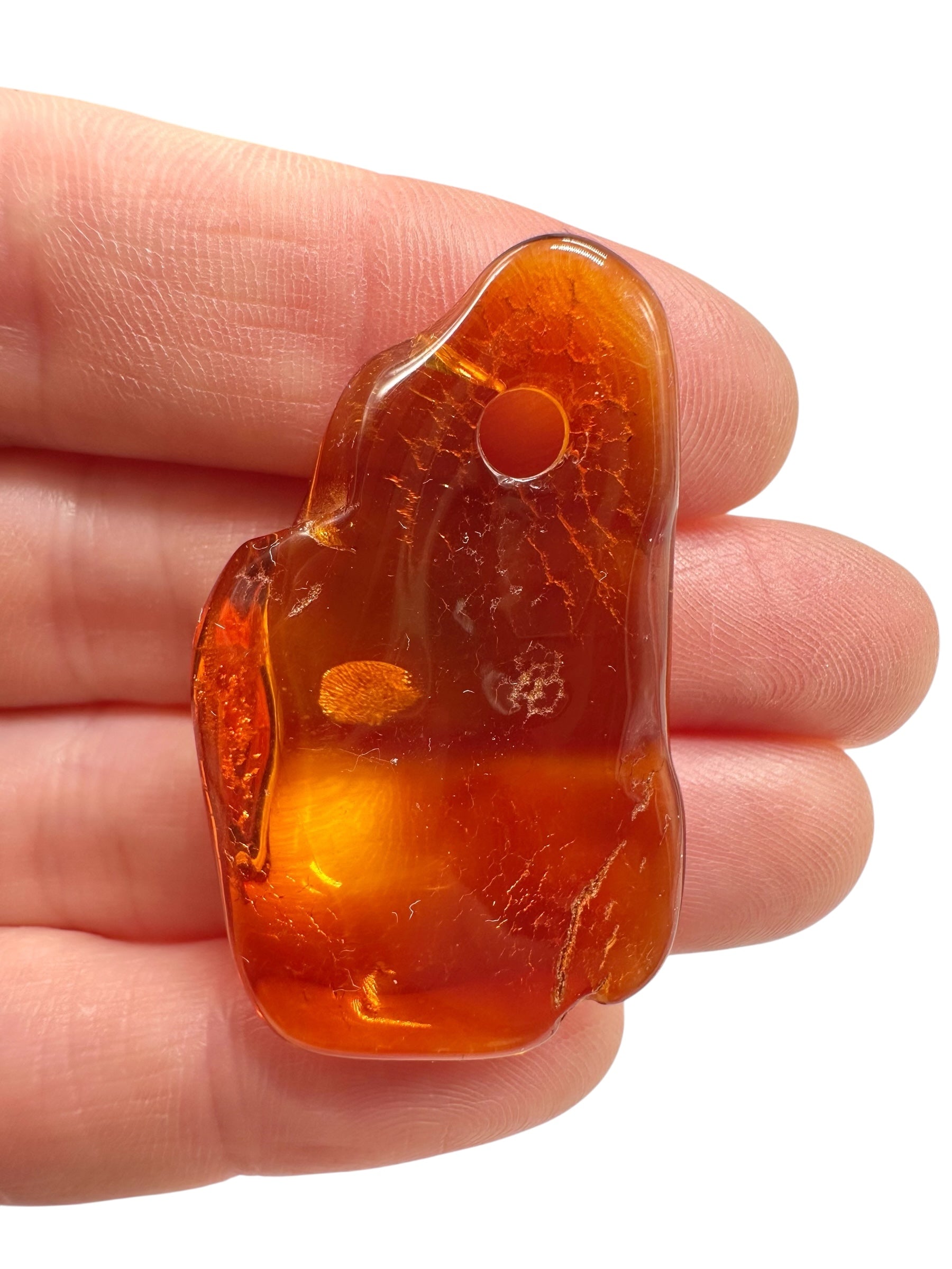 Amber with a drilled hole for hanging 4g – Lithuania - JND152