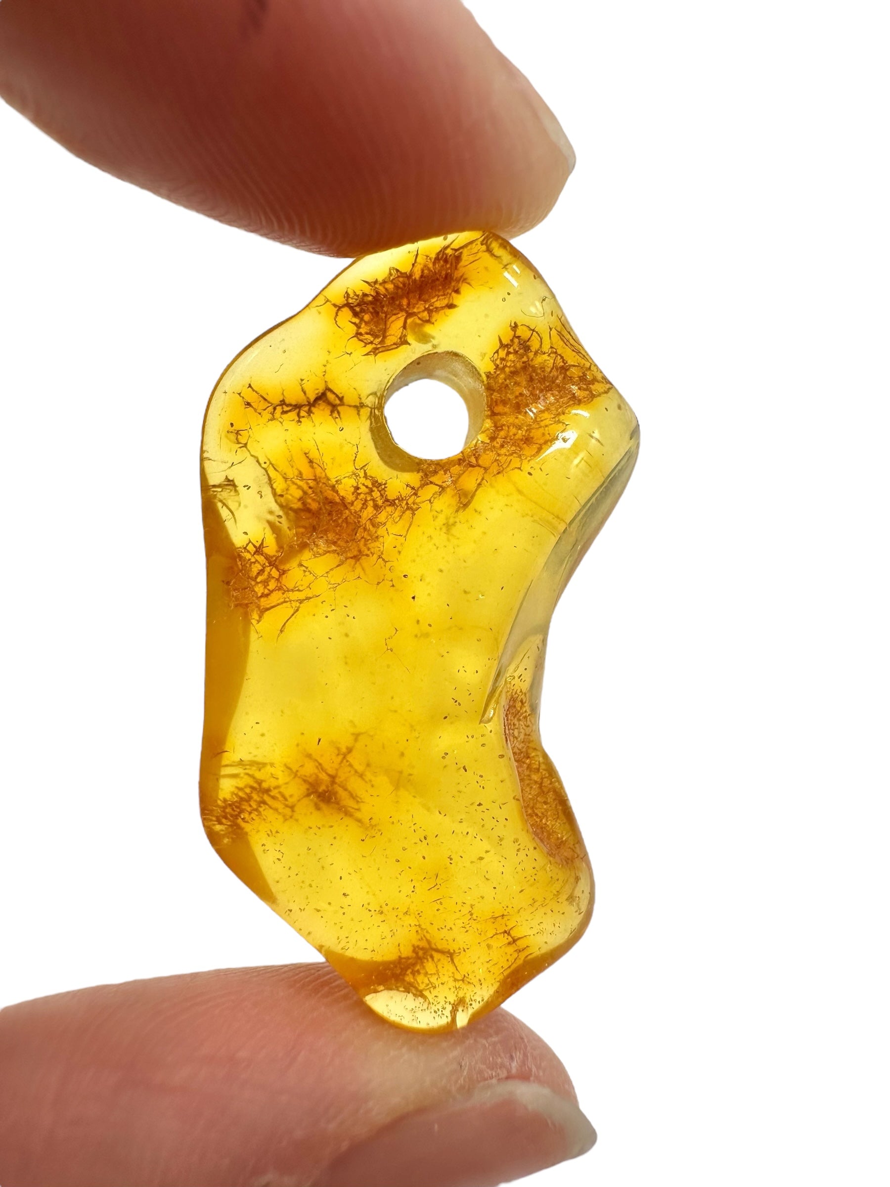 Amber with a drilled hole for hanging 2,7g – Lithuania - JND153