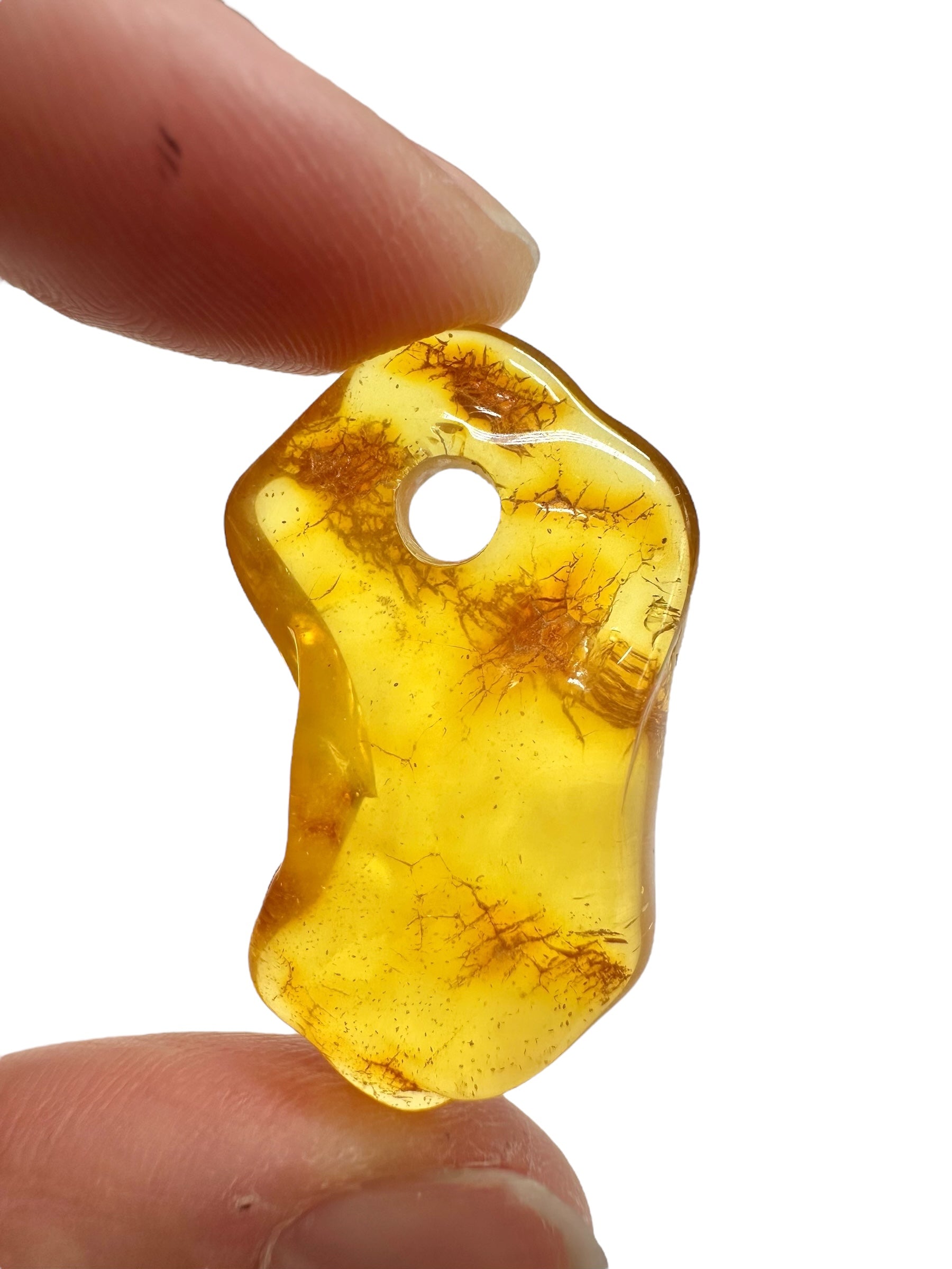 Amber with a drilled hole for hanging 2,7g – Lithuania - JND153